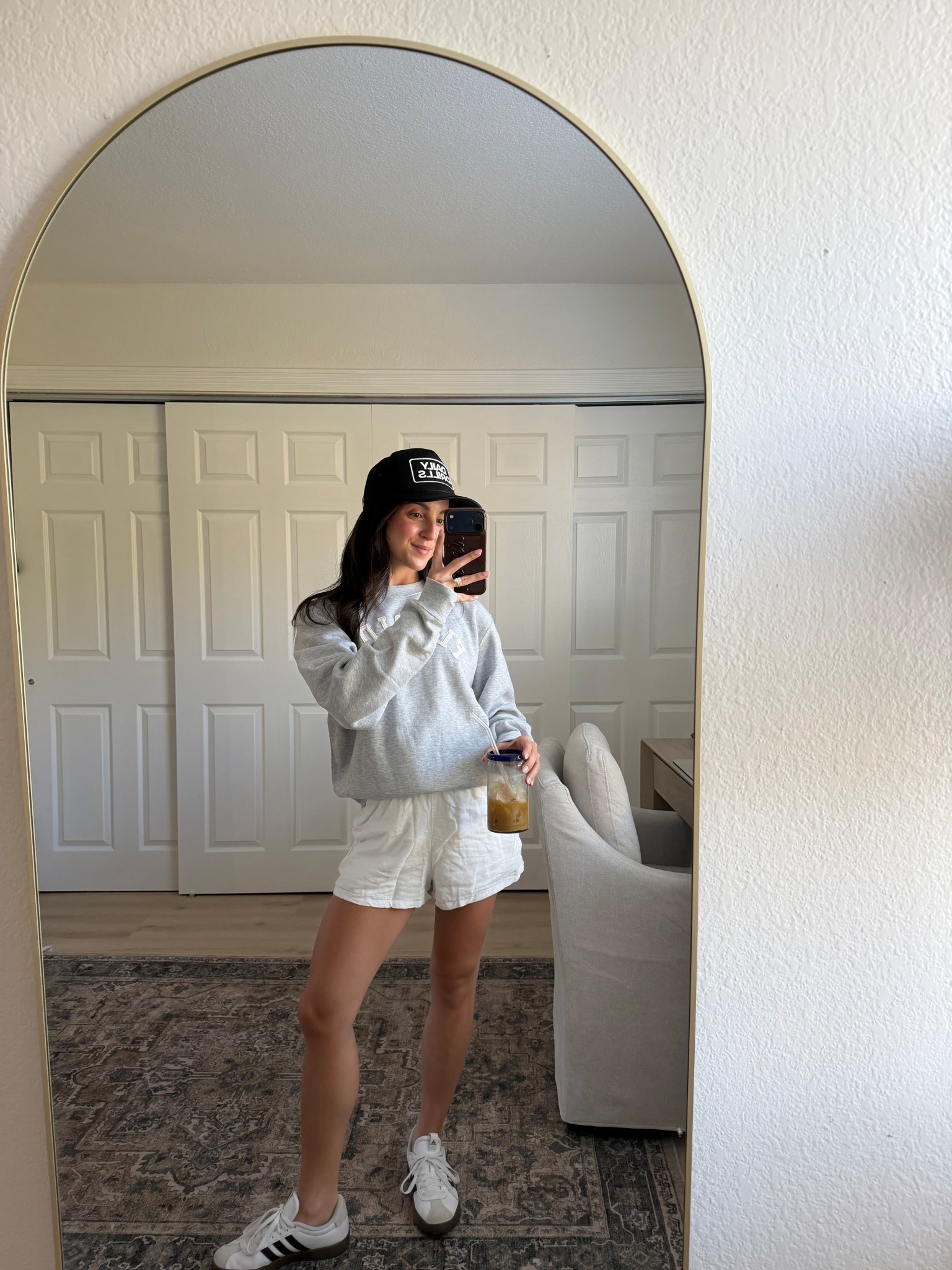 Customized crewneck from Magill! Casual spring outfits 2026, linen shorts, oversized crewneck, adidas sneakers, trucker hat 

#LTKdayinmylife #LTKootd #LTKgrwm