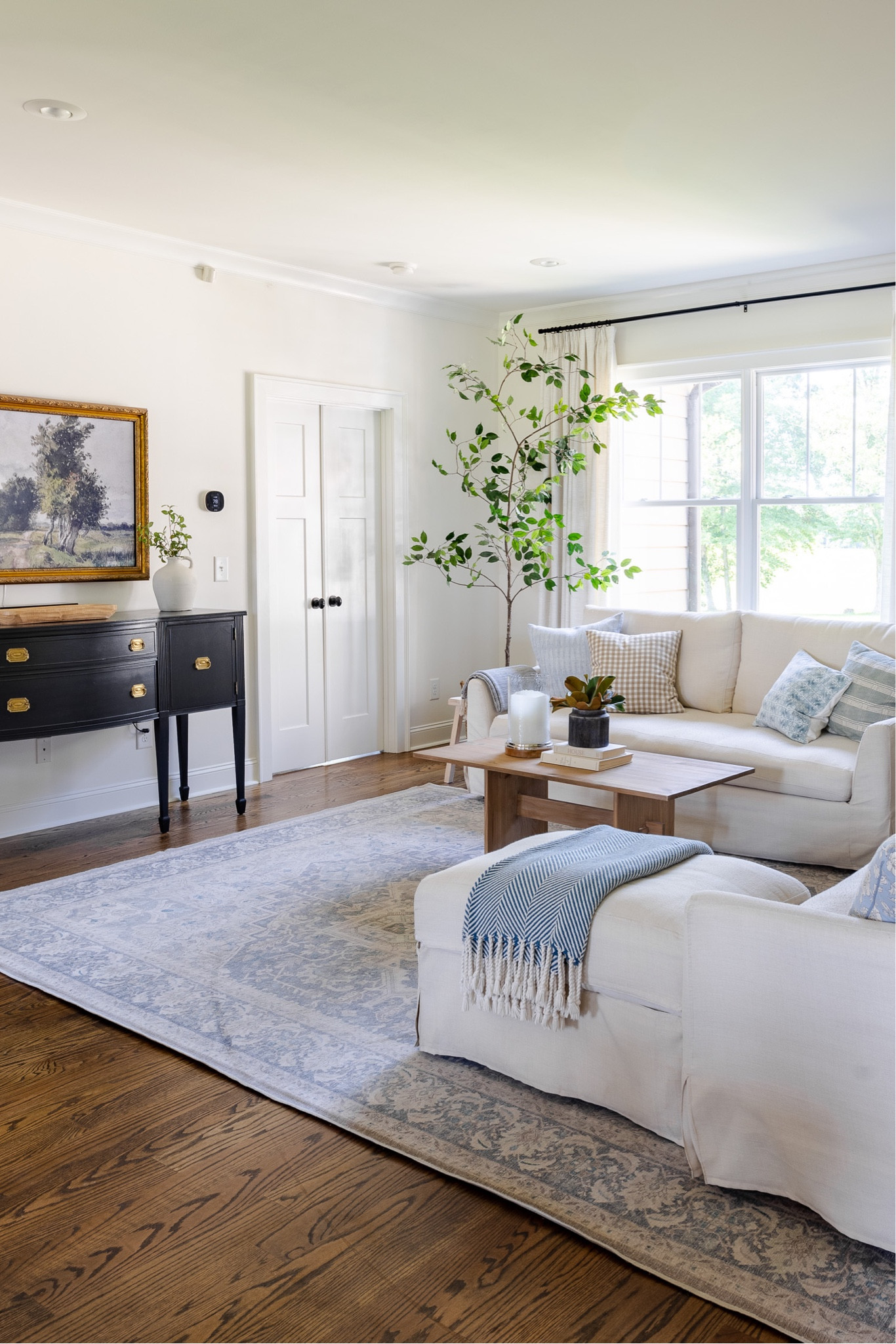 Living room with two pages curtains, ruggable, Amazon home, faux tree, frame tv

#LTKSeasonal #LTKFind #LTKhome