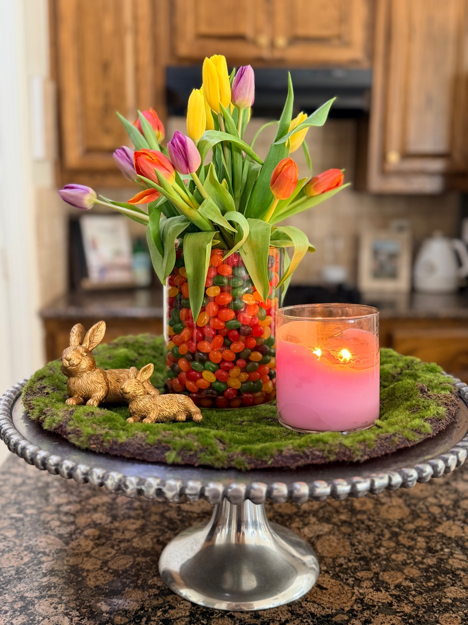 Easy Easter Centerpiece Idea (Tulips + Jelly Beans) 🌷🐣

The prettiest (and easiest) Easter centerpiece 💐
I used fresh tulips and jelly beans in a clear vase for a simple, high-end look that takes minutes to put together. Perfect for Easter brunch, hosting, or a quick spring refresh ✨
Linking similar vases, faux tulips (a great alternative if you want it to last) and my centerpiece decor here 💐

#LTKSeasonal #LTKHome #LTKspring