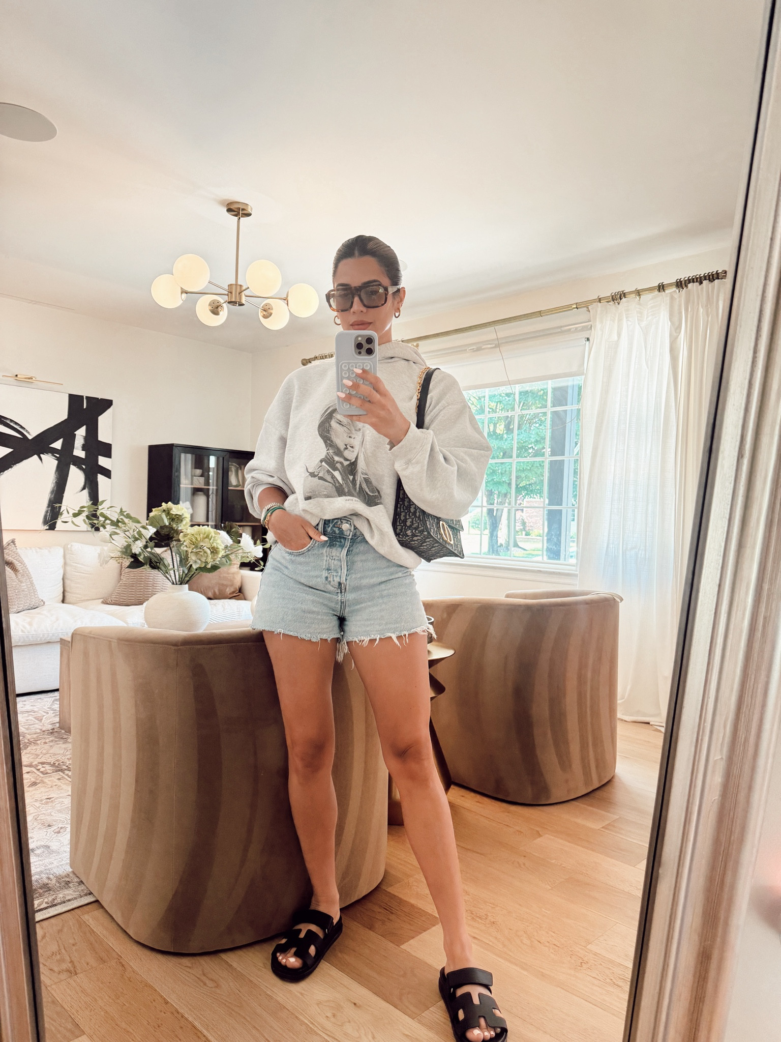 This hoodie is sold out but the sweatshirt version is available and i love it! Shorts im size 26 and sandals TTS 

#LTKStyleTip #LTKFindsUnder100