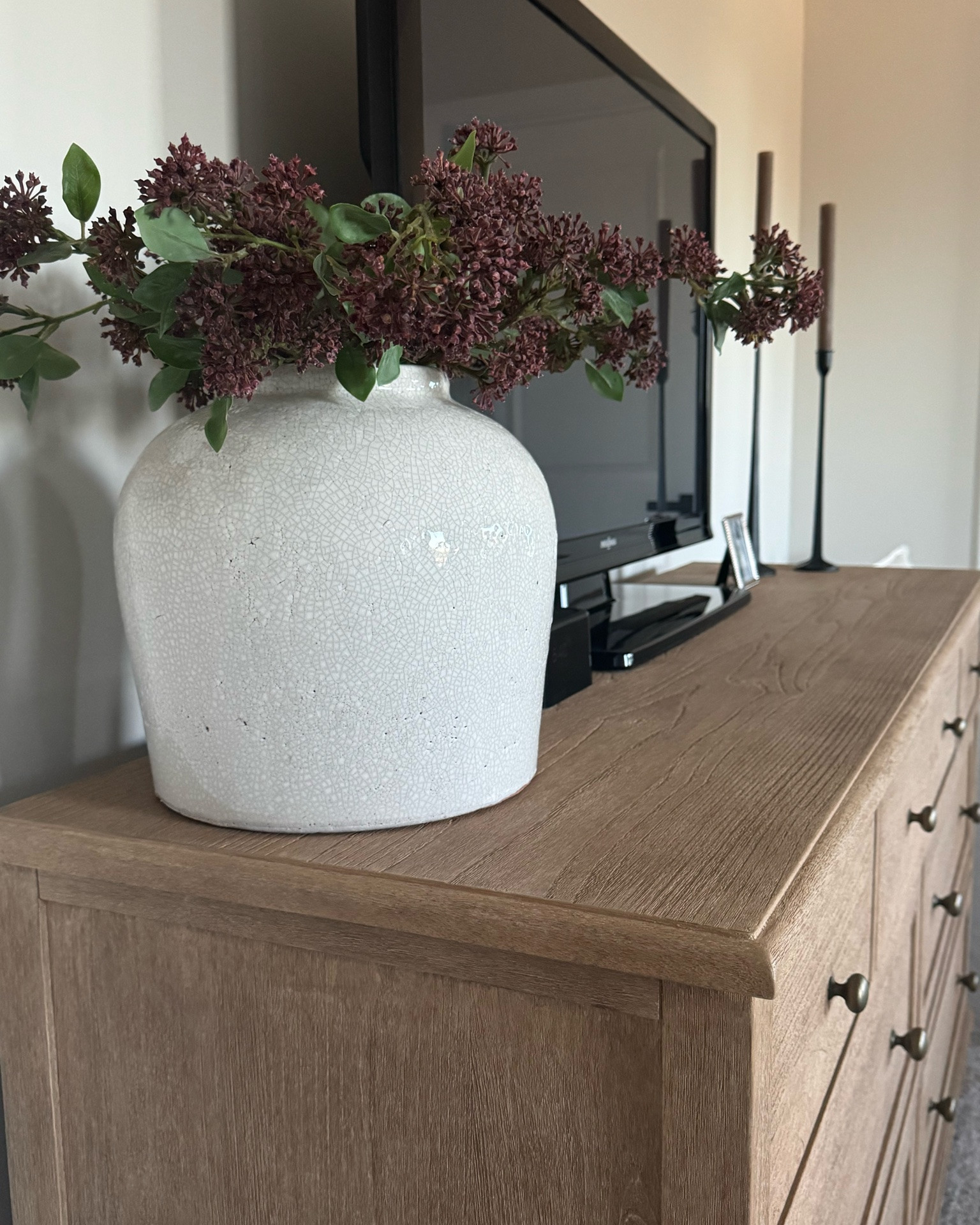 Dresser styling, berry stems, cream chair, brown throw blanket, brown pillow covers

#LTKdayinmylife #LTKHome #LTKSaleAlert