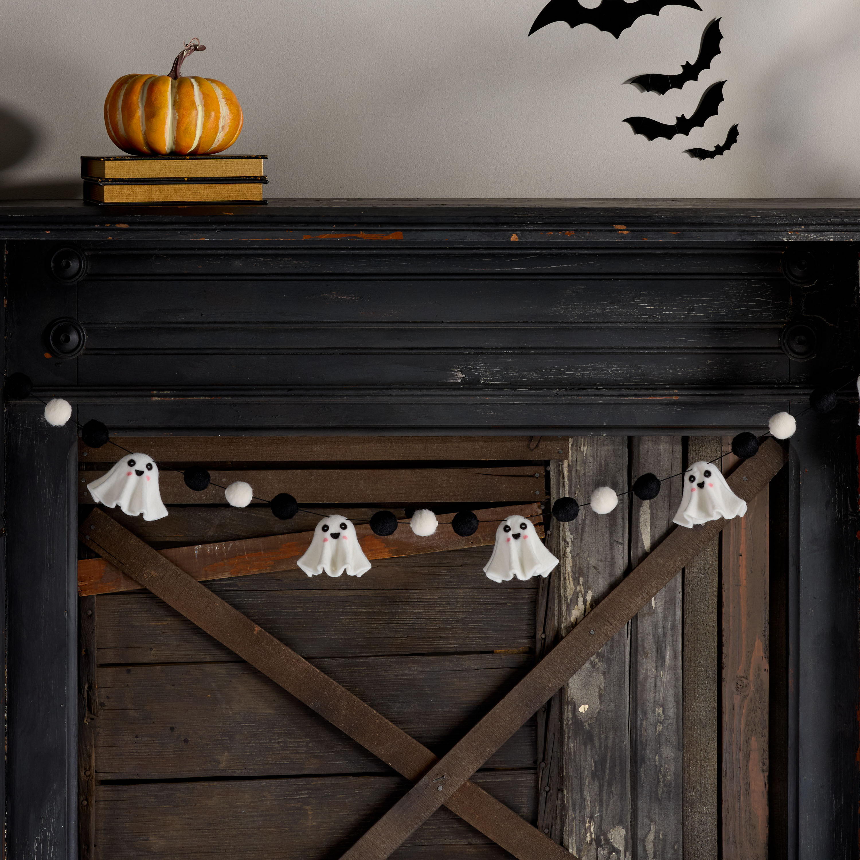 White and Black Wool Ghost Pom Pom Garland | World Market