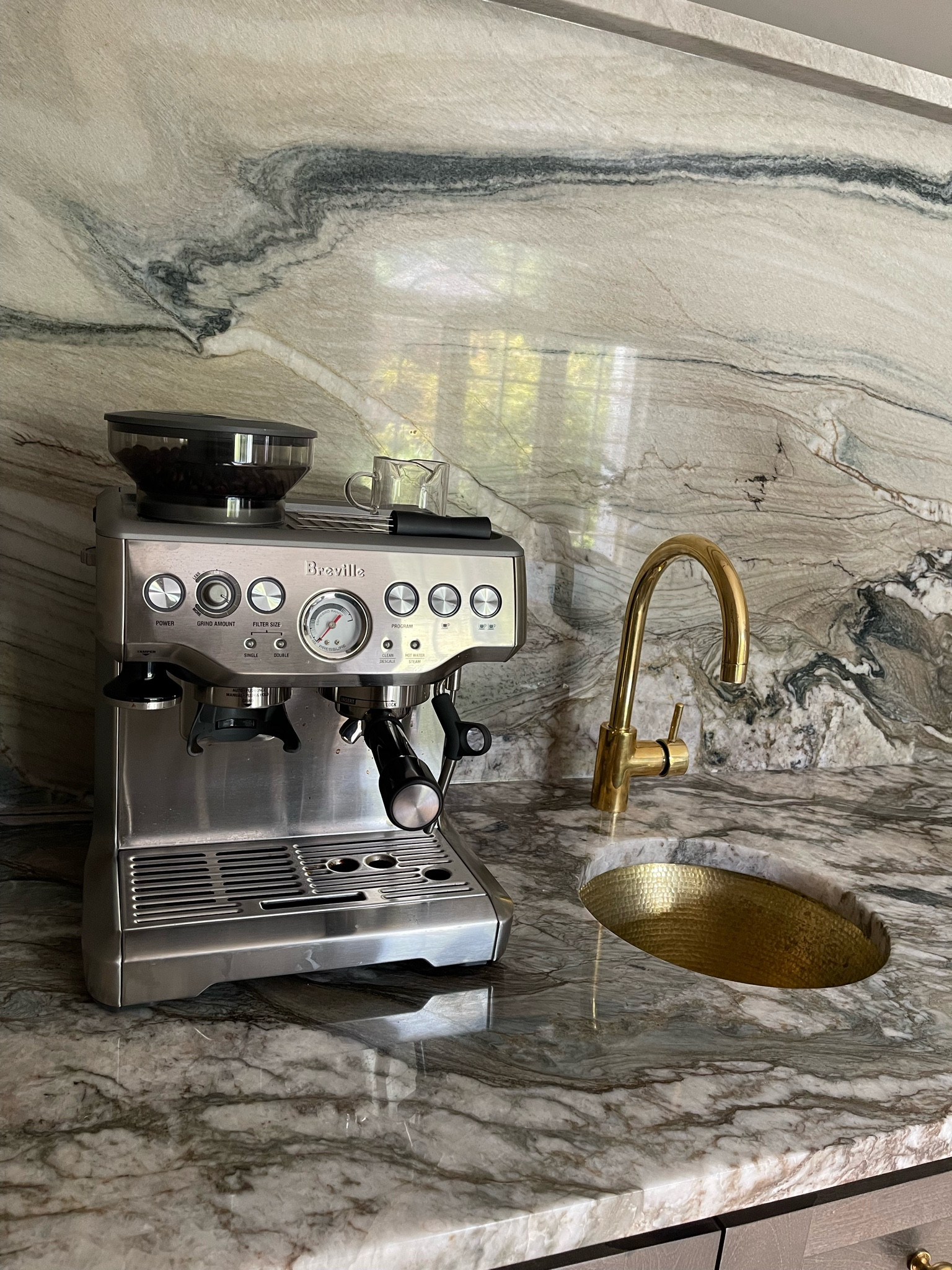 Breville espresso machine on wet bar 

#LTKsalealert #LTKfamily #LTKhome