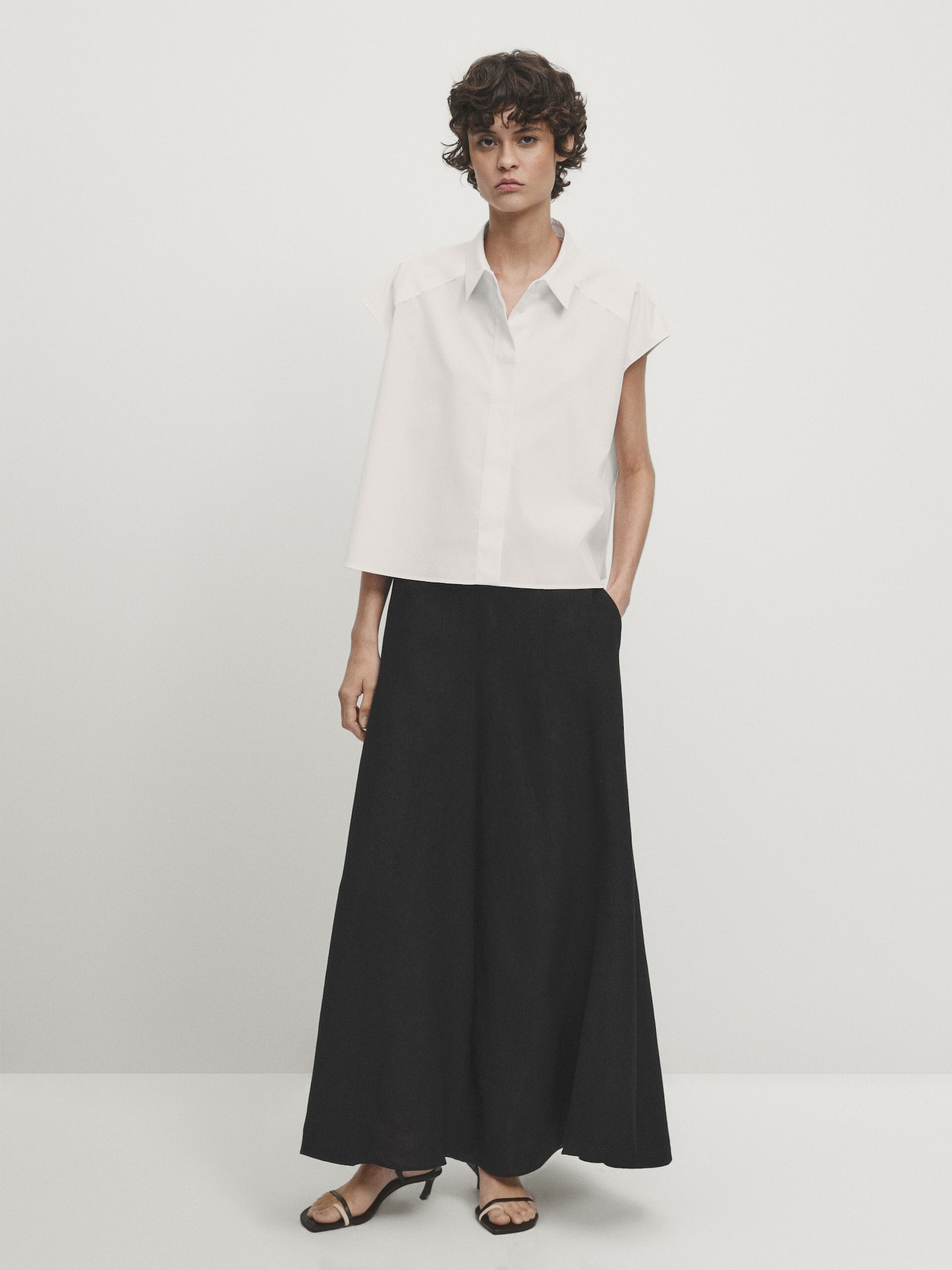 Sleeveless shirt with frayed detail - Studio | Massimo Dutti US
