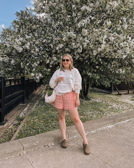 Comfy spring to summer midsize outfit - graphic sweatshirt (sized up to XXL for an oversized fit), pink linen striped boxer shorts (tts, wearing L), Amazon Birkenstock inspired clogs, Coach shoulder bag



#LTKmidsize #LTKsummer #LTKcanada