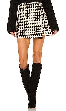 Alice + Olivia Renna Button Wrap Mini Skirt in Almond & Black from Revolve.com | Revolve Clothing (Global)