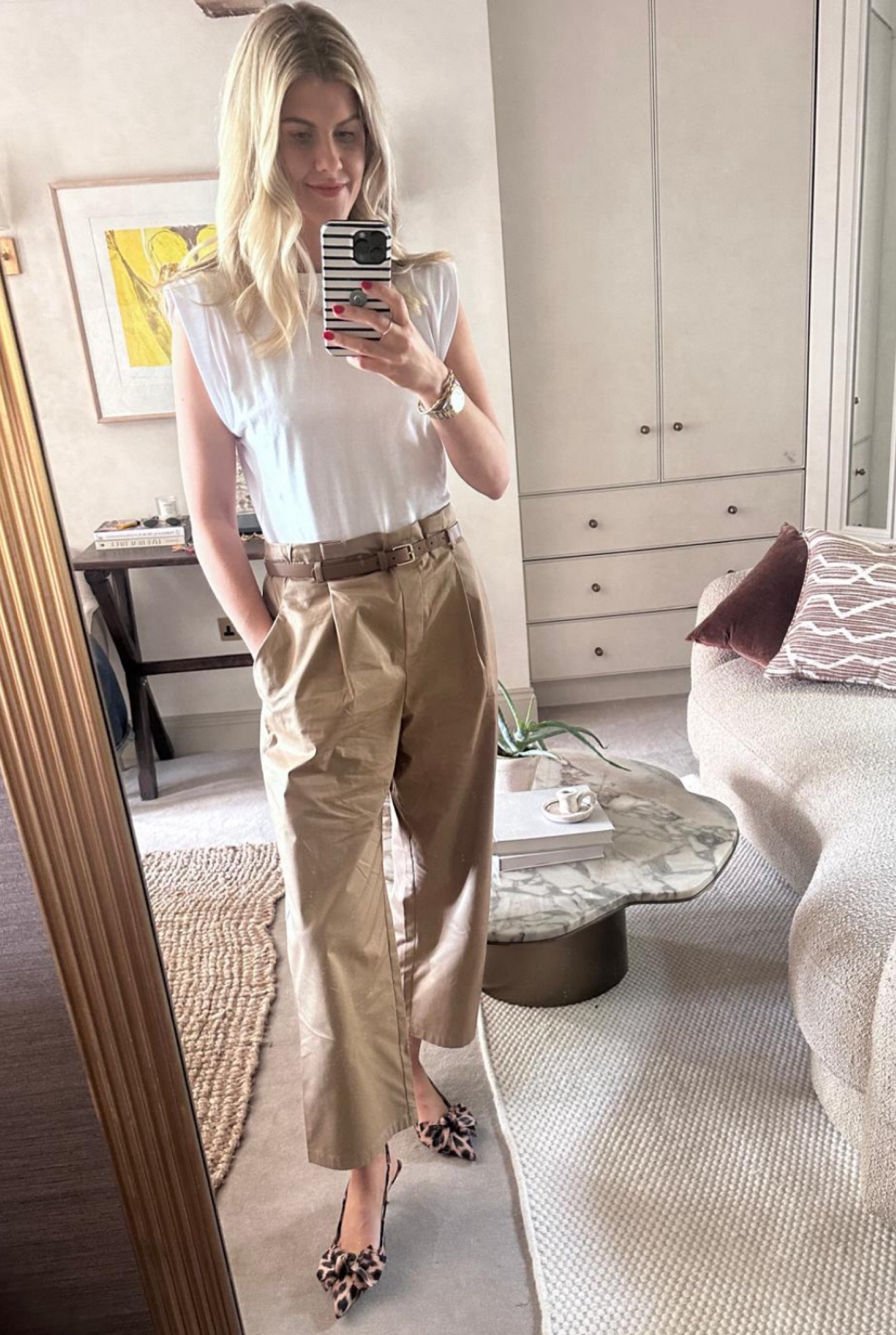 White short sleeve top, brown linen pants and a miu miu leather belt, with cheetah print heels  

#LTKstyletip #LTKworkwear
