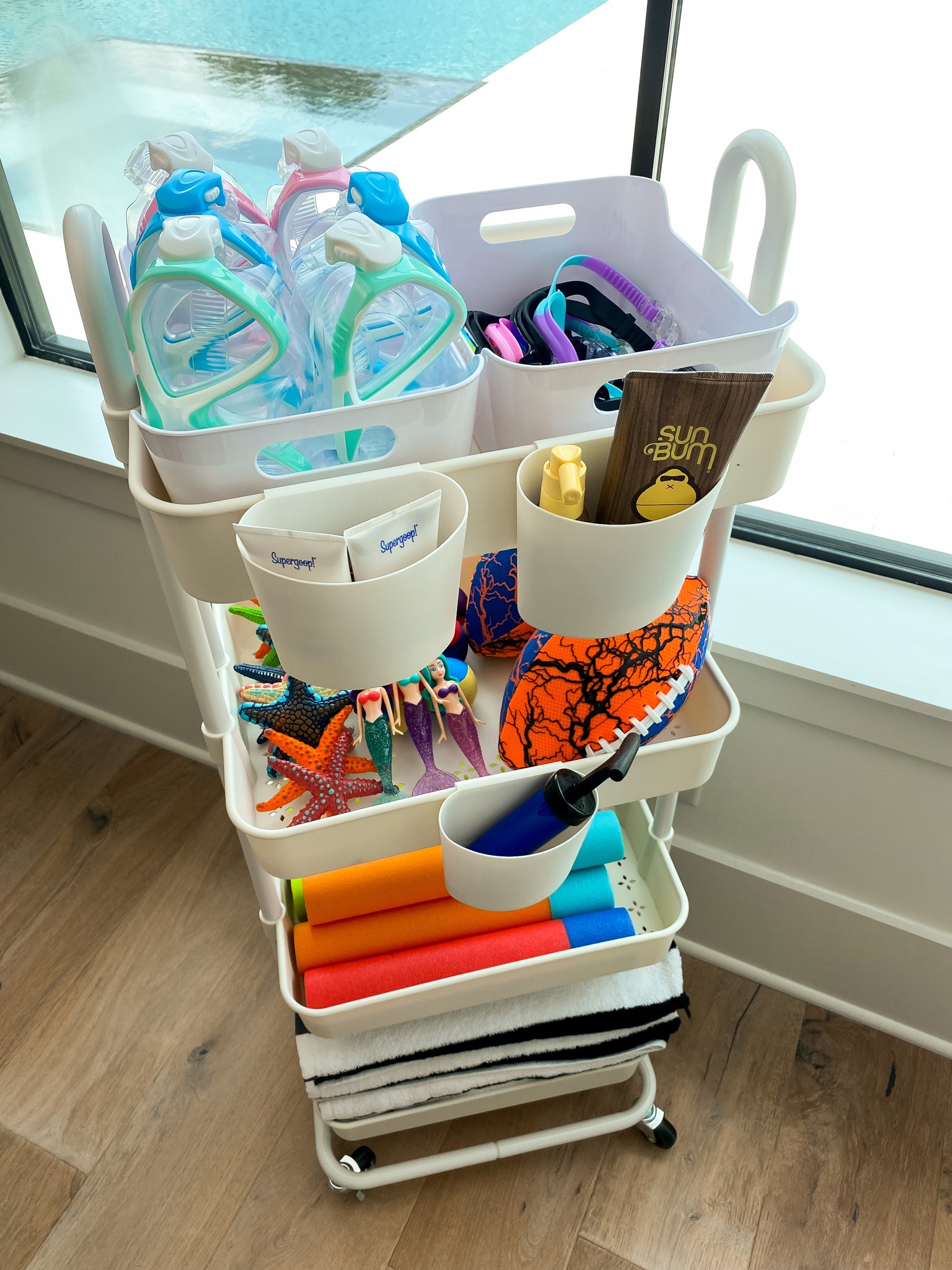 The perfect rolling cart for storing all of  your pool toys, goggles, water squirters, and sunscreen! 



#LTKunder50 #LTKhome #LTKswim