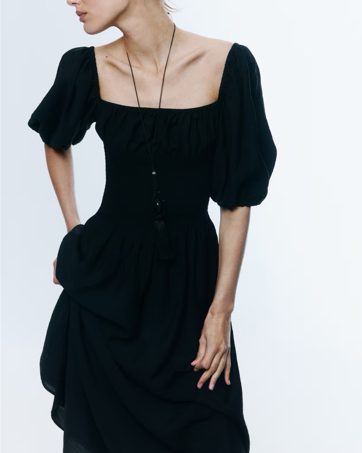 Black puff sleeve smocked midi dress 

#LTKSeasonal
