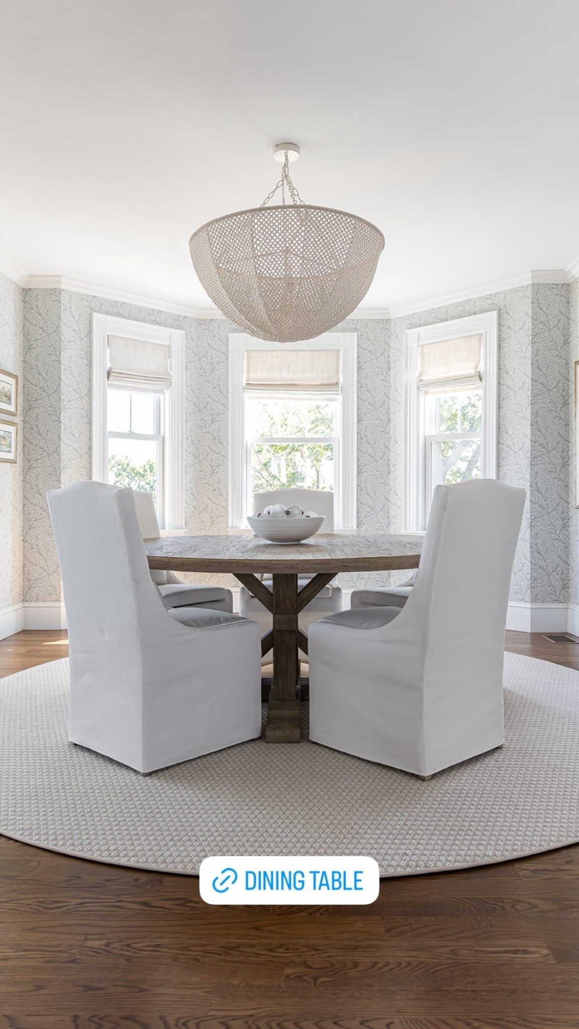 A dreamy dining room with a rustic round oak table, slipcovered chairs and a showstopping chandelier always has our hearts



#LTKSeasonal #LTKHome #LTKStyleTip