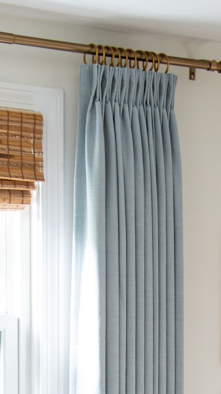 High-quality curtains on a budget, wicker window shades, and brass fixtures for your bedroom or living room, coastal style home decor

#LTKhome #LTKfamily