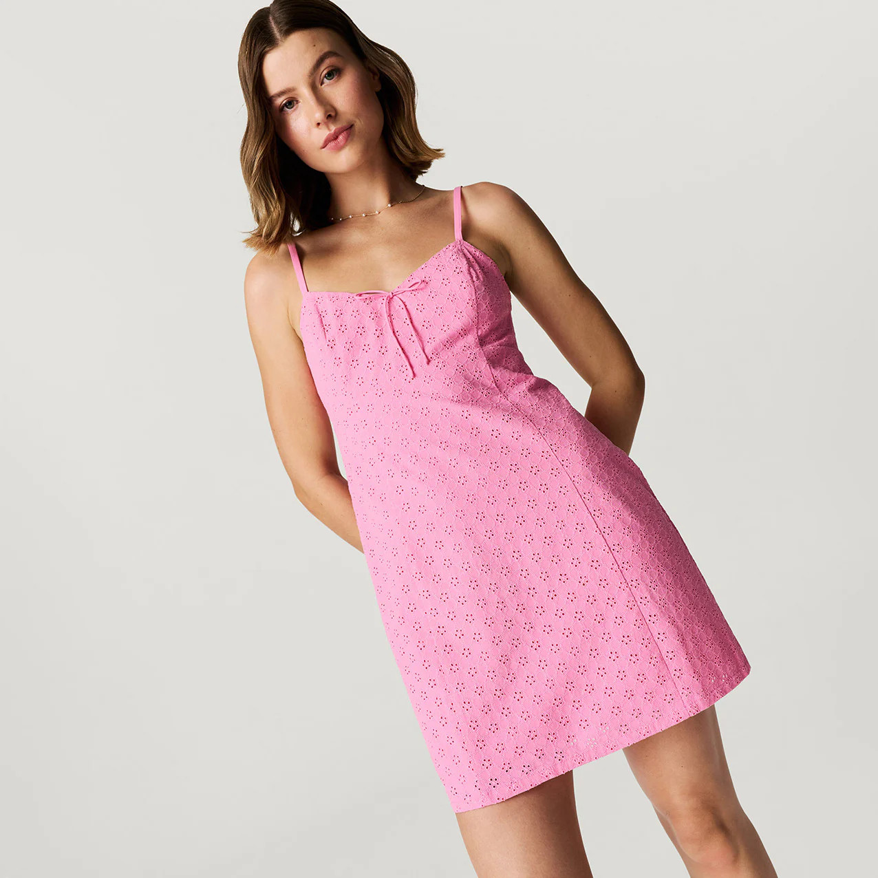 Solid Pink Sleeveless Aurora Pink Women's Eyelet Mini Dress | Posh Peanut® | Posh Peanut