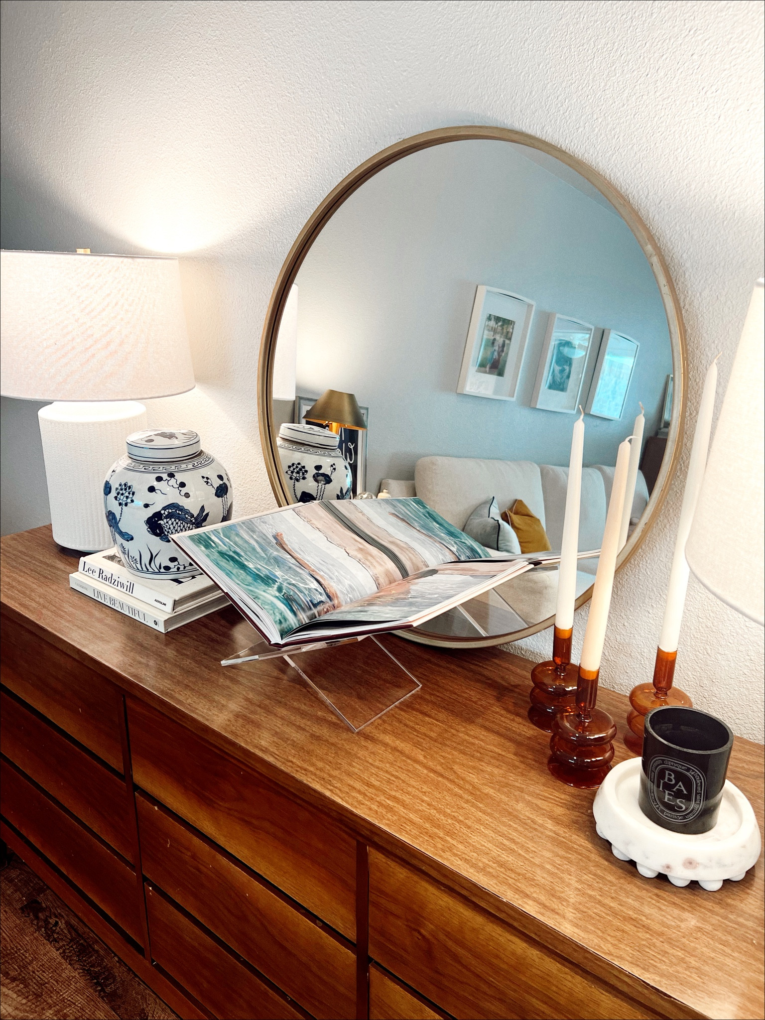 It's springtime, which means brightening up my home and dressing spaces to fit the season we're in. With warmer temps coming through, I like to create a fun and carefree color story within my home. Learning from the best of the best on @alicelanehome's podcast, Dear Alice, bringing in colors like lavender, orange, and powder blue creates warmth and airiness into your interiors. With this in mind, I'm in love with my new ginger jar with hints of blue and new candlestick holders in this gorgeous amber tone. X, H // @alicelanehome #alicelanehome #alicelanepartner