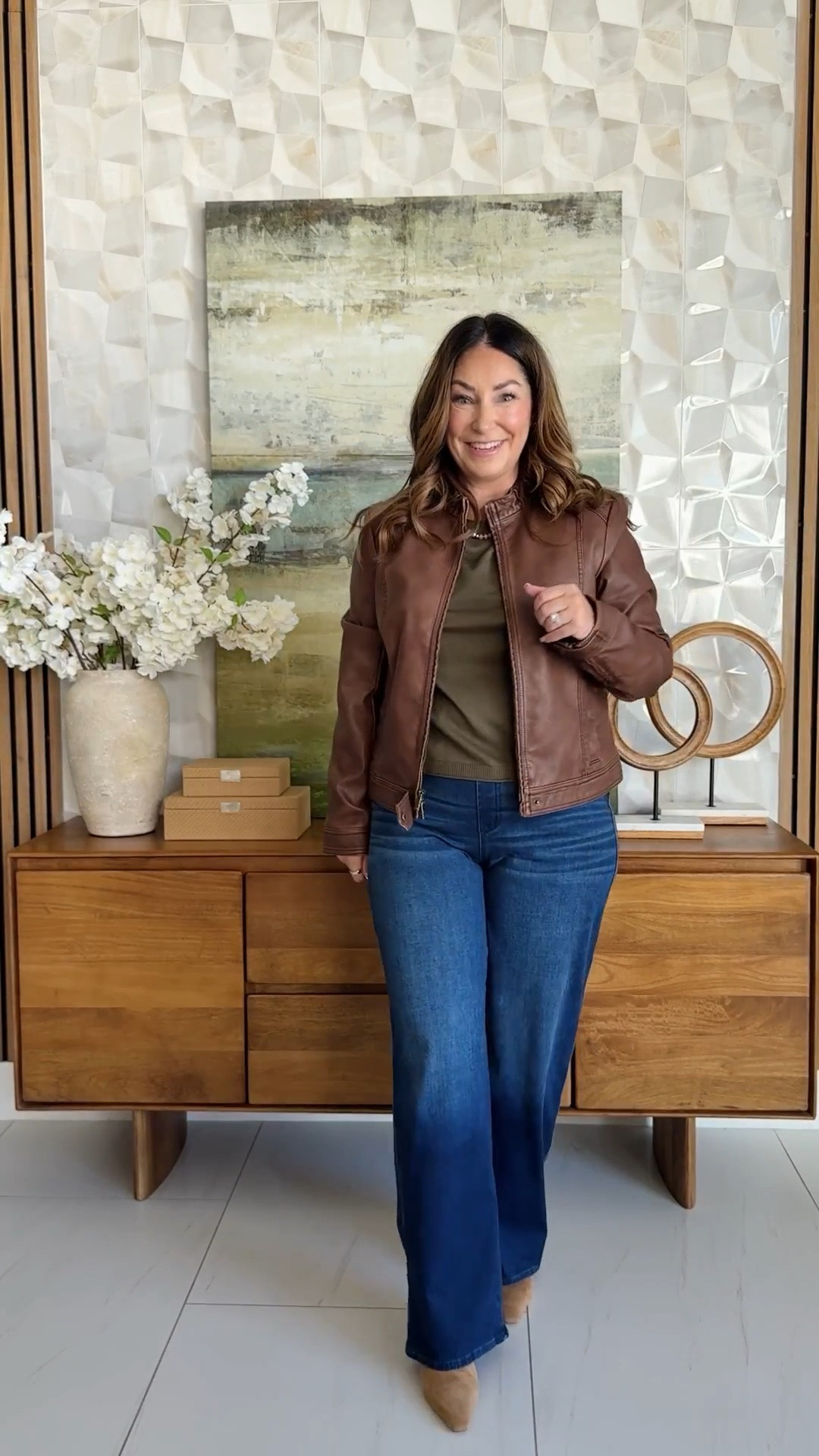 Fall layers done right 🤎 Brown faux leather moto jacket over an olive green sweater, paired with dark wash wide-leg jeans, a tan suede hobo bag, and brown suede booties. An edgy-meets-cozy casual look in rich fall tones.

Sizing: jeans tts, L/12 | top, L | jacket, L 

#LTKSeasonal #LTKOver40 #LTKmidsize

#LTKMidsize #LTKOver40 #LTKSeasonal