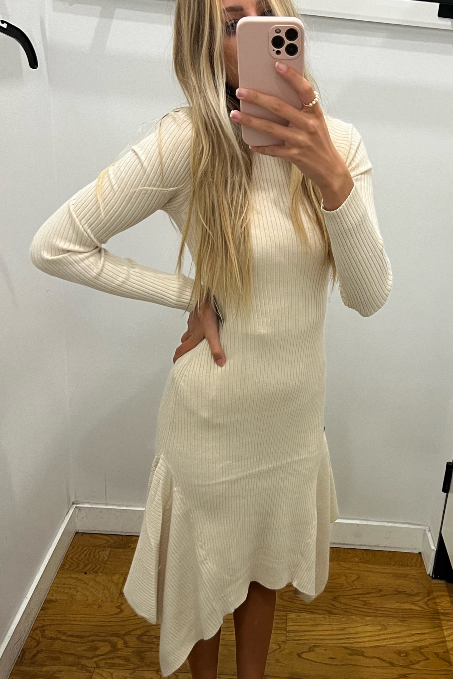 Express has so many cute dresses on Sale!! Loved this new take on a sweater dress with the asymmetrical ruffle bottom! So feminine! Also in black and other fav dresses for the holidays from Express below! 

#LTKsalealert #LTKunder50 #LTKSeasonal