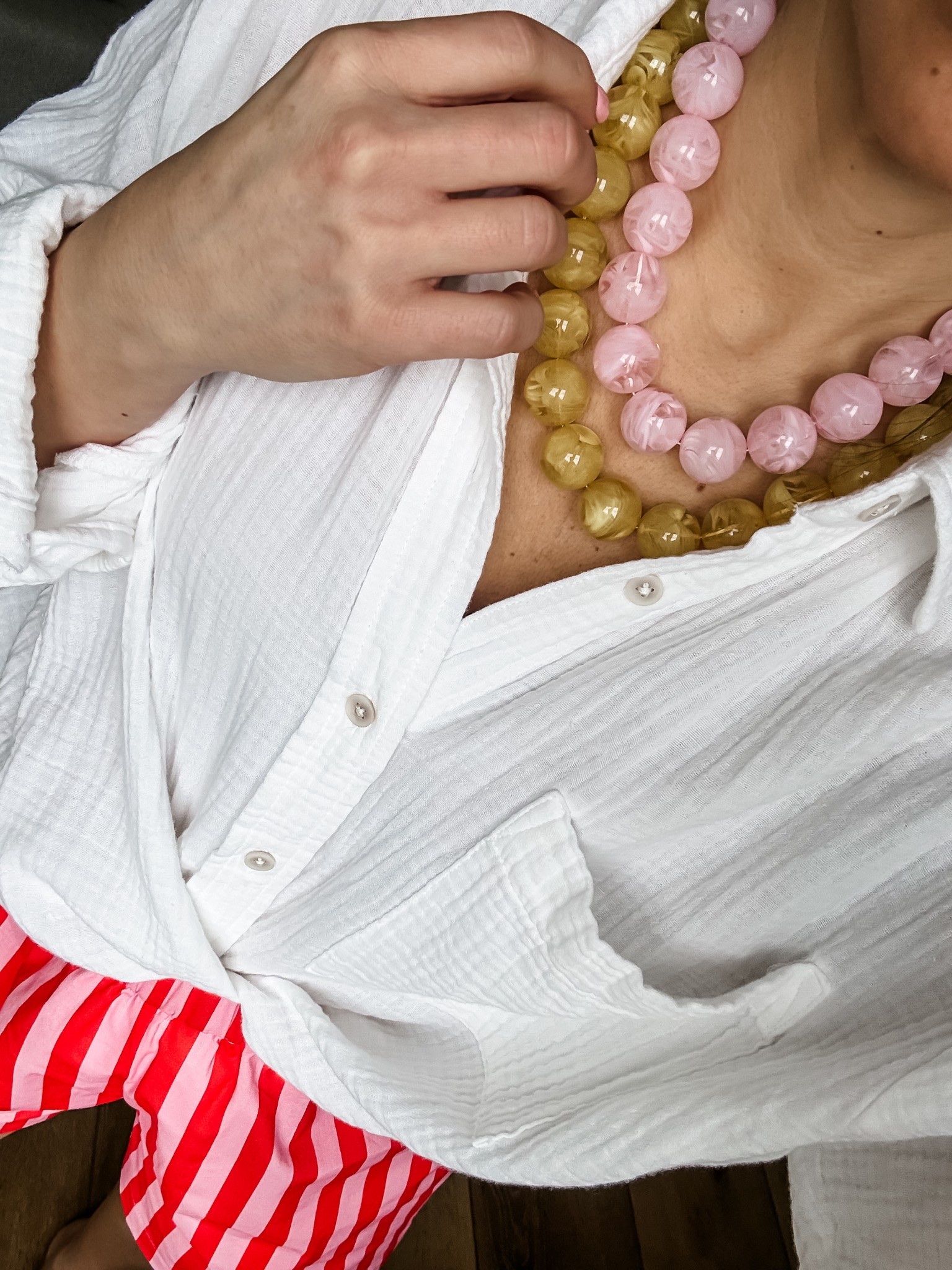 White gauze button down small. Beaded necklaces.

#LTKOver40