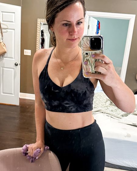 New Amazon sports bra I just got in!! Sorry for the sweaty selfie 😅Love the strappy back details— swipe to 👀!! Wore it to workout in under my fave Amazon tank tops & loved the fit & support it gave! I’d say it’s a great workout bra-medium impact for barre, yoga, dance cardio, Zumba, Pilates, etc! I’m typically a 34 D and I got the size m. Fits great! 

#LTKSeasonal #LTKFitness #LTKActive
