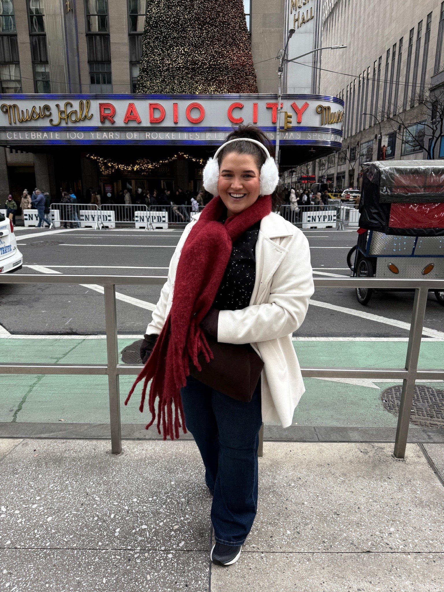 NYC exploring the city outfit inspo 🧣 Torrid peacoat, black sparkle sweater from Old Navy, flare jeans, sneakers, ear muffs + scarf. Layered with thermals to stay nice and warm in the winter weather! ❄️ Wearing a size XXL, 2 in coat and 20 jeans. 

#LTKootd #LTKPlusSize #LTKdayinmylife