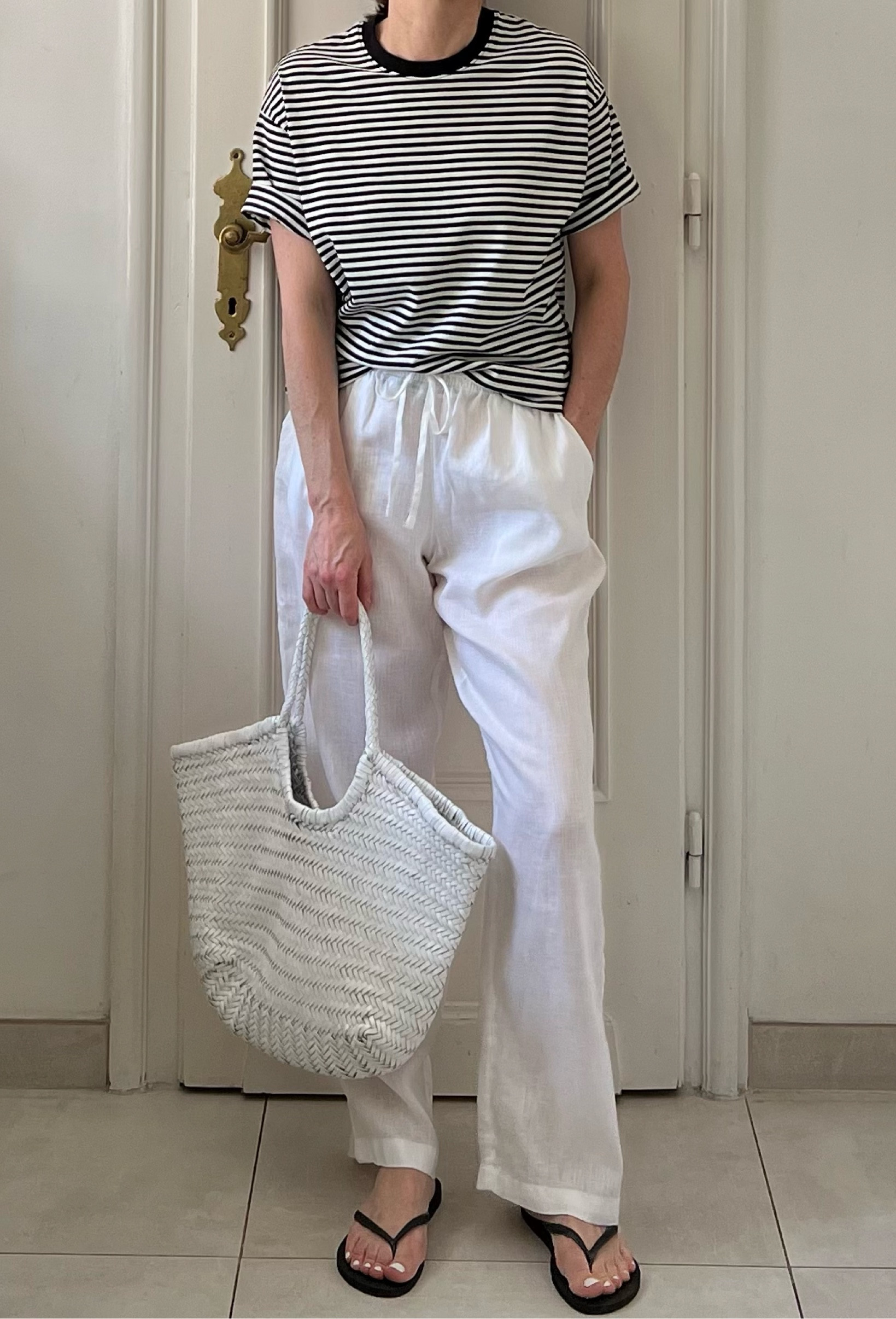 Summer outfit, beach outfit, holiday outfit, white linen trousers, white linen pants, striped tee, striped t-shirt outfit, woven bag, woven leather bag, summer bag, woven summer bag, white bag, white leather bag, flip flops, Dragon Diffusion bag

#LTKsummer #LTKuk #LTKbag
