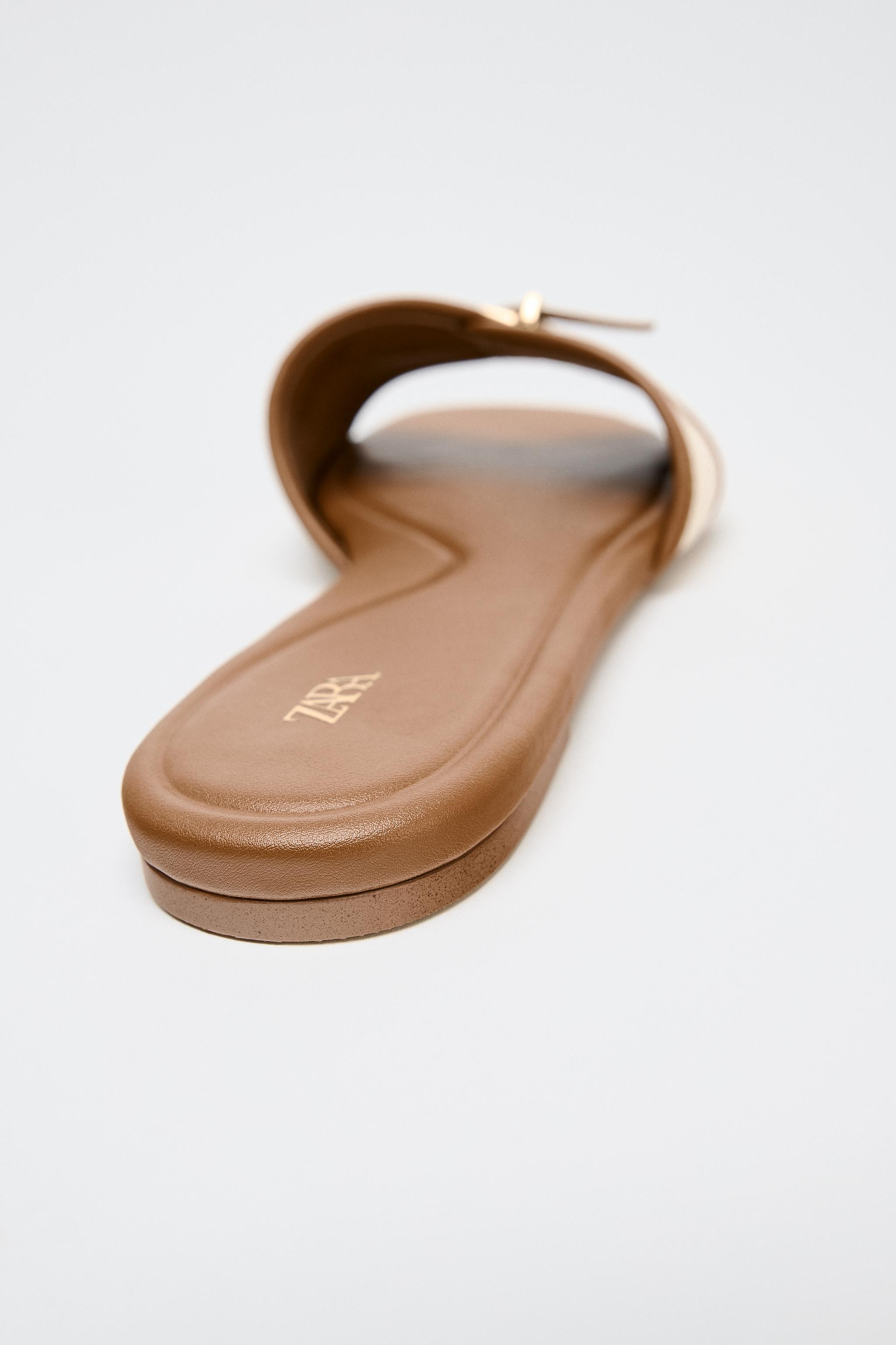 Flat canvas sandals. Buckle strap detail at the front. Round toe. Sole height: 0.4 inches (1 cm) | Zara US