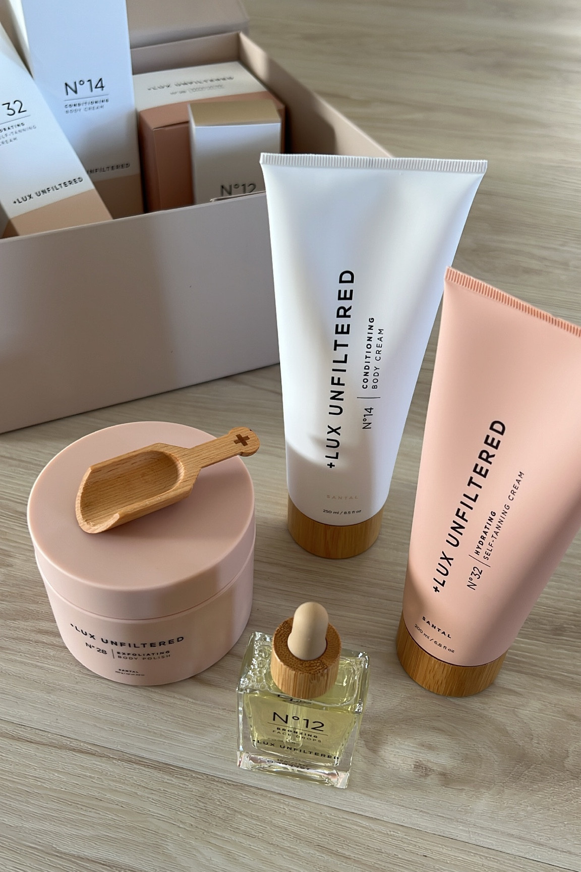 + Lux Unfiltered self tanning products. Self tan lotion hydrating, body lotion conditioning cream, bronzing face drops, exfoliating body polish scrub, 