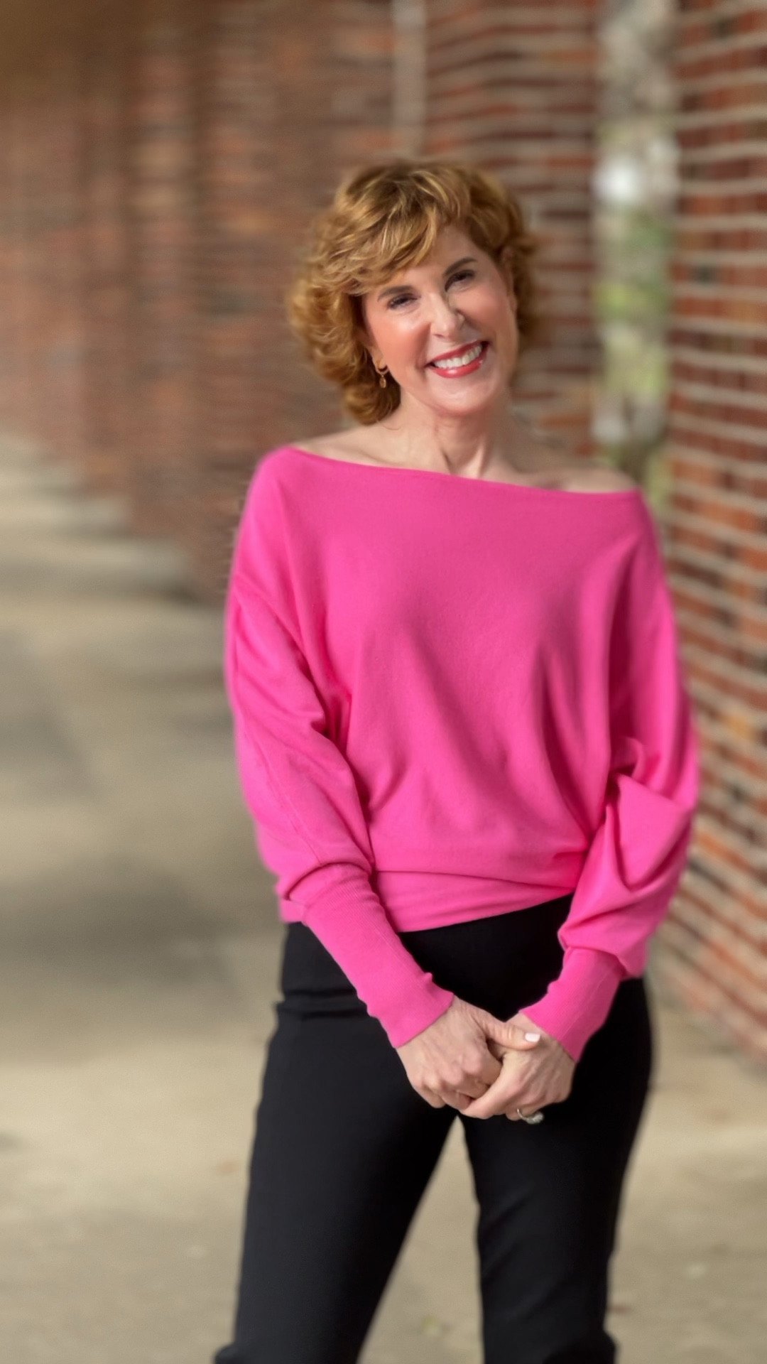 This pink top can be worn off the shoulder, one shoulder, or as a boatneck top. It’s made of a lightweight, soft, stretchy fabric and has universally-flattering dolman sleeves.

The Spanx straight leg pull on pants are so candy and they make you look amazing.

My chunky mule sandals have cushy braided straps that make them really comfortable.

Click the links below for details!

#LTKover40 #LTKshoecrush #LTKVideo
