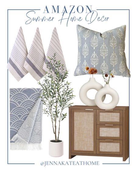 Amazon summer home decor items including kitchen tea towels, blue and white decorative, throw pillows, blue and white scalloped design bathroom towels, artificial olive tree, decorative round vases, and rattan storage cabinet. Coastal style home decor.

#LTKHome #LTKFamily