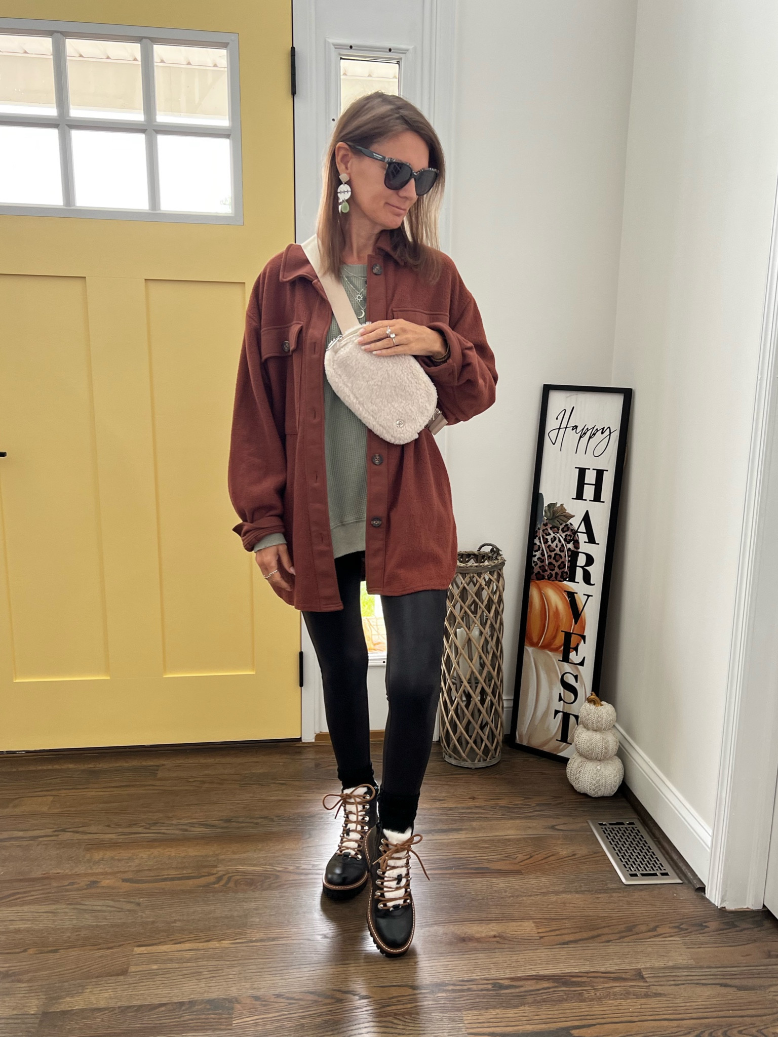 Top is 40% off Fall Spanx leggings outfit. Brown shacket, black faux leather leggings, AE waffle oversized sweater, boots, black boots with fur, hiking boots, everywhere belt bag, fuzzy belt bag, Victoria Emerson silver necklace. 

#LTKstyletip #LTKshoecrush #LTKsalealert