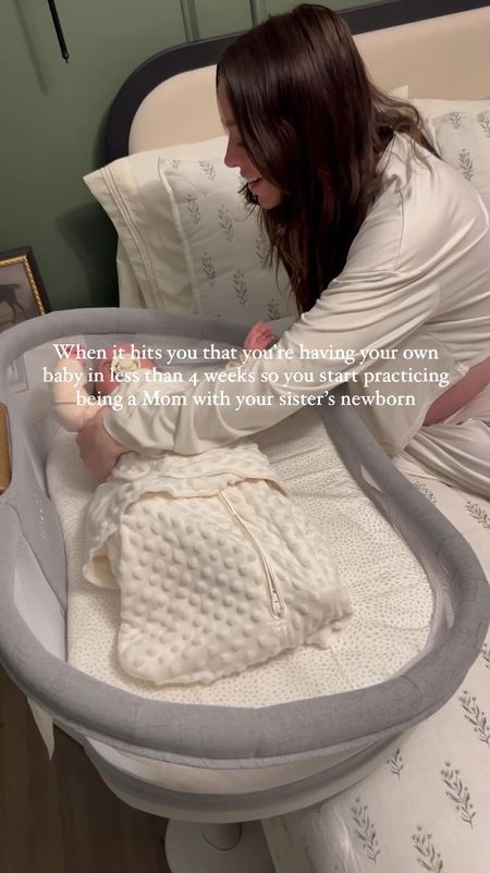 Practicing on my new @halosleep BassiNest 🤍💤
• Rated best bassinet by @forbes 
• Swivel feature brings baby extra close 
• Lowering wall for easy access 
• Breathable mesh walls 
• Soothing center with 2 vibration modes and calming sounds 
• Also, grab the super cozy sleep sacks! 

#LTKGiftGuide #LTKbump #LTKbaby