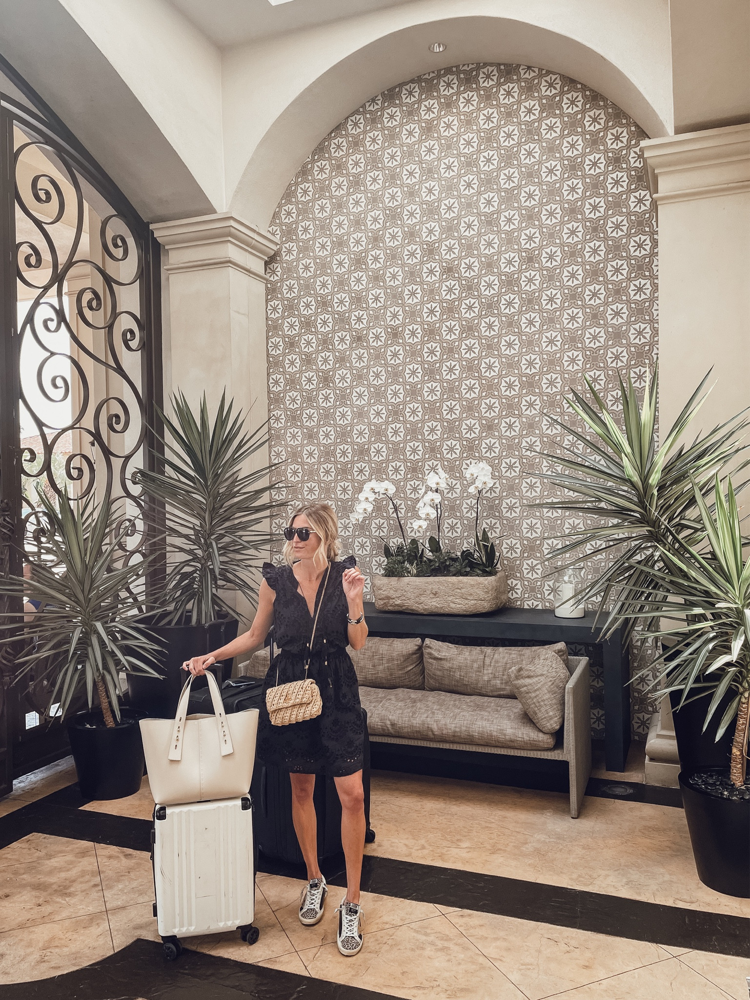 Elevated travel look✈️ similar black dress, similar sneakers, raffia crossbody bag, similar tote, suitcase and sunglasses. 

#LTKFind #LTKtravel #LTKstyletip