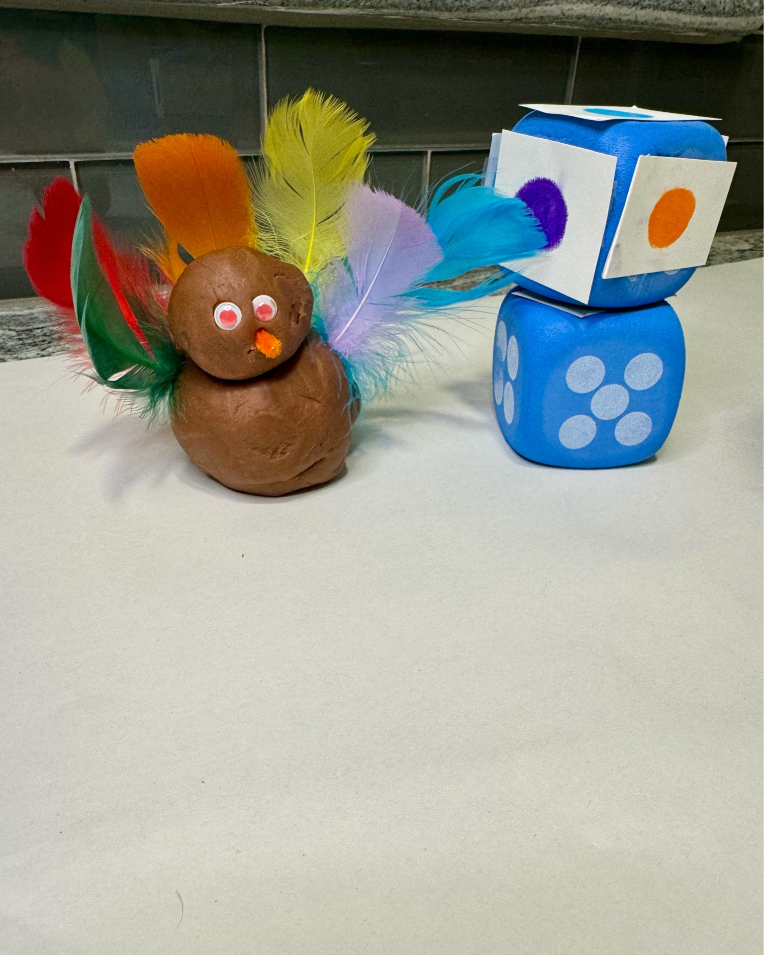 
Roll A Turkey is such a fun game to play while working on many skills! Subitizing, counting, 1-1 correspondence, number identification, color identification, fine motor, sensory play & concentration. 

We used a regular dot dice for number sense, and I made a color dice for my youngest to work on color recognition. An easy way to incorporate different skills and development with the same game! 



#playbasedlearning #toddlerplay #homeschooltoddler #toddleractivityideas #sensoryplay #homeschool #prekmath #kindergartenmath 

#LTKSeasonal #LTKKids