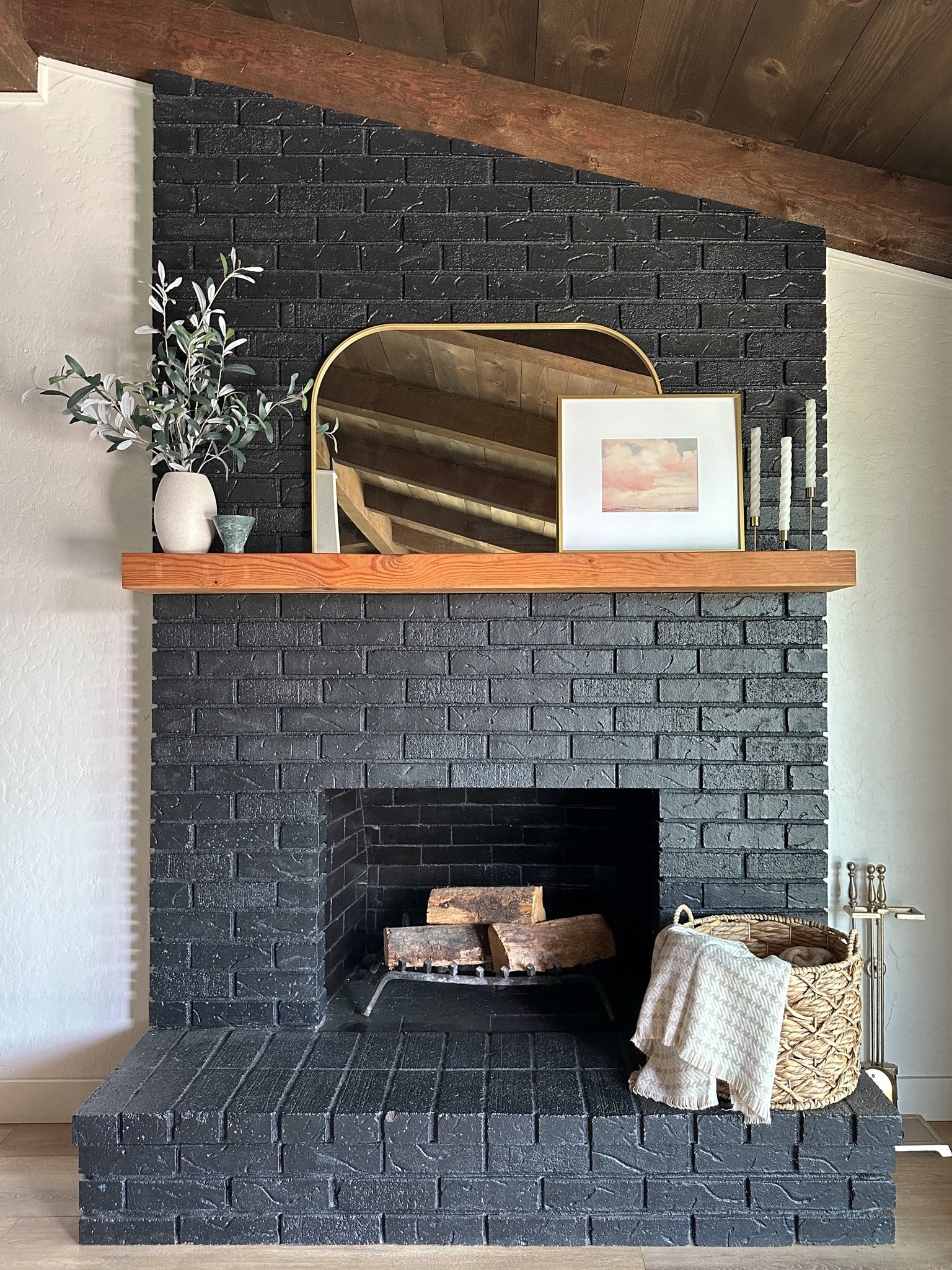 Fireplace mantle styling. Faux olive plant, brass mantle mirror, spring decor  

#LTKfindsunder50 #LTKhome #LTKSeasonal