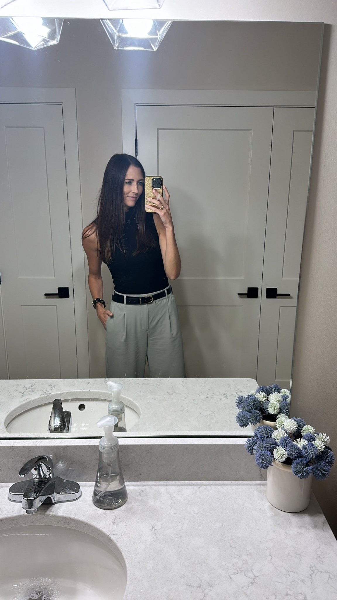 Beyond Yoga work pants
Work pants on sale
Amazon belt
Sleeveless turtleneck
