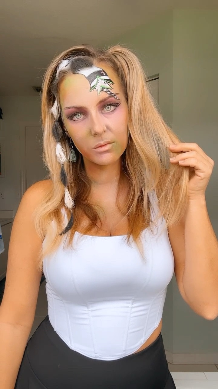 Making my hair into the beetle juice snake 🐍 for this fun Halloween look 🎃 Halloween costume. Easy Halloween costume ideas. White corset top. Black skirt. Boots. 

#LTKVideo #LTKHalloween #LTKSeasonal