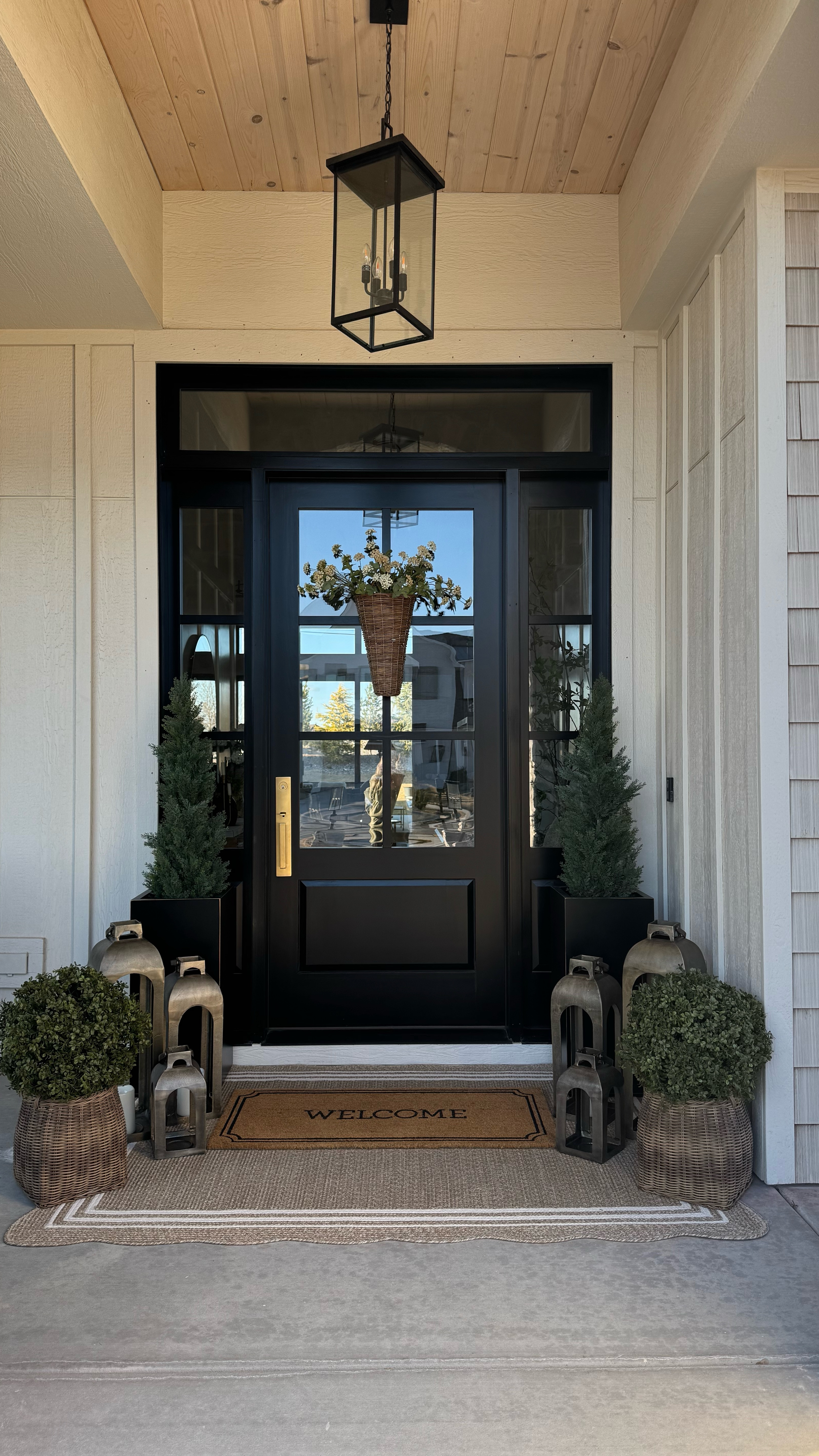 Would you believe most of my porch consists of look for less finds? I’m loving the way this came together - fresh, light and welcoming as we transition into Spring. These pretty Target lanterns are currently 20% off, as well as the scalloped rug! Don’t get me started on the metal Amazon planters…they are a little spendy but worth every penny! And I used the cutest, affordable sedum stems in my door basket for a fresh but understated Spring style. 

#LTKHome #LTKStyleTip #LTKSpringSale