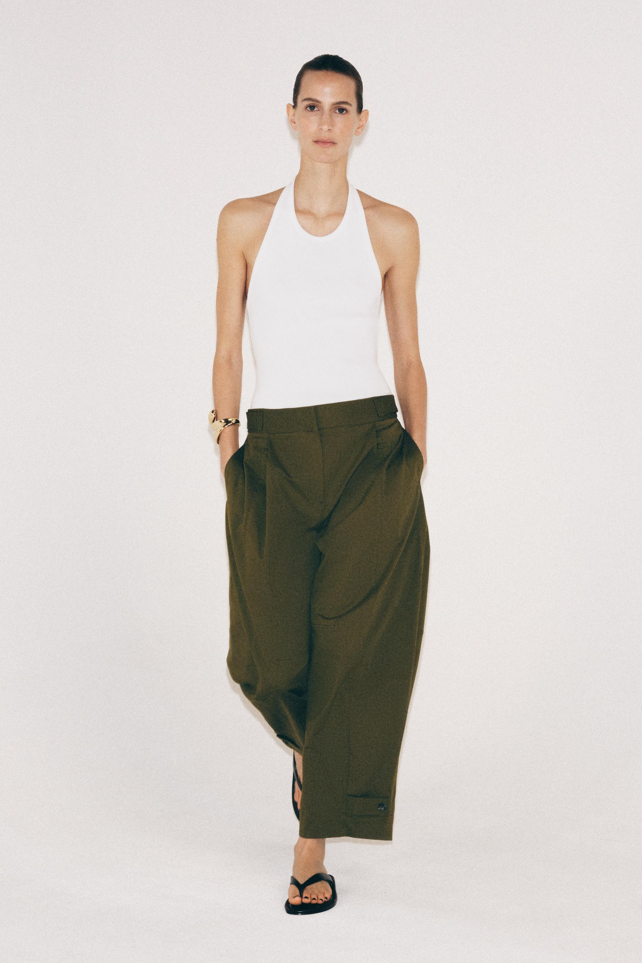 ZARA WOMAN COLLECTIONPants made of a cotton blend yarn. Mid-rise with an adjustable waist featuri... | Zara US