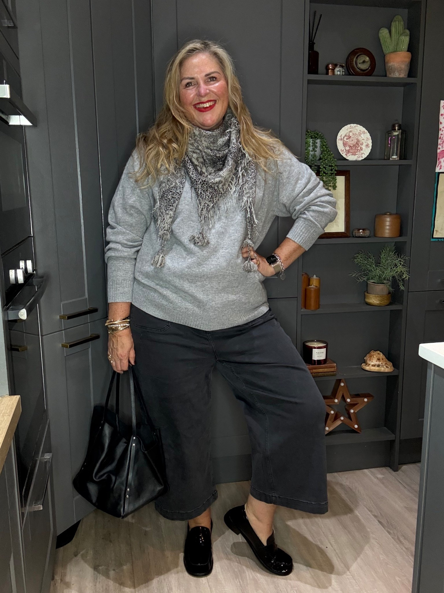 Grey jumper, grey leopard scarf, grey jeans, black bag, black loafers 

#LTKjeans #LTKautumn #LTKplussize