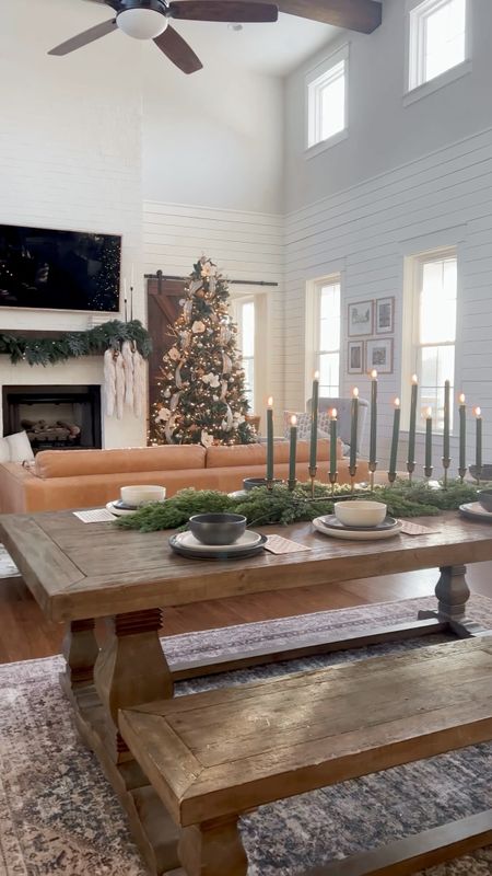 Christmas and holiday living room decor tree picks garland mantel mantle cedar and eucalyptus garland bells two tone place settings holiday tablescape candelabra taper candles wood farm table and benches dining room open concept living and dining kitchen white knit long stockings modern farmhouse style

#LTKHoliday #LTKstyletip #LTKhome