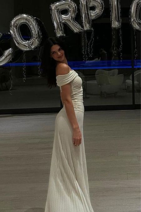 Kendall celebrating her bday in a $1,900 Khaite dress