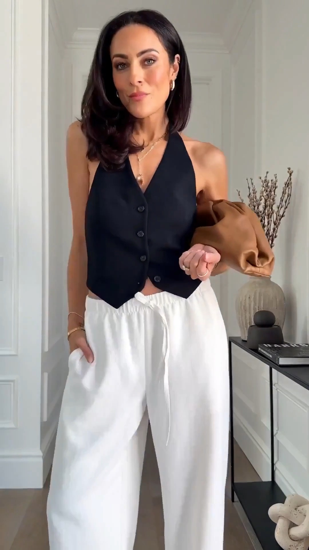 Summer essential: my favorite pull on pants! 🤍 sized up to a size small for a super relaxed fit!  These are so perfect for spring and summer! 




Summer, style, pants, vest 



#LTKSeasonal #LTKgrwm #LTKOver40