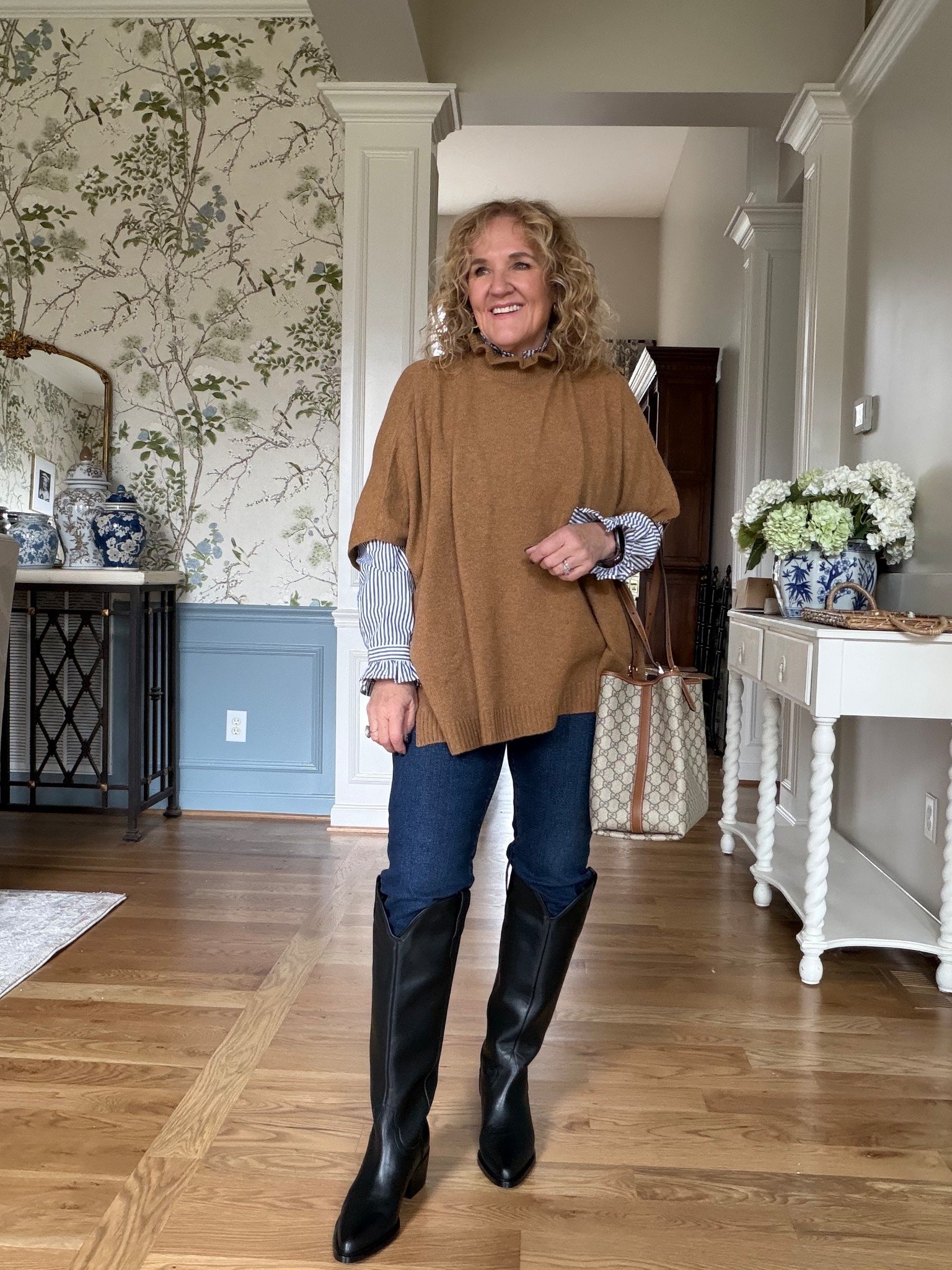 Thoughts on the tall boots and jeans? I think this poncho and tailored blouse is a fresh take! 
Boots I ordered a 9. I’m usually a 9.5 
Blouse size medium 
35% off my jewelry Allie & Bess NANETTE35

Winter outfit poncho black boots @quince @jcrewfactory

#LTKSaleAlert #LTKOver40 #LTKSeasonal