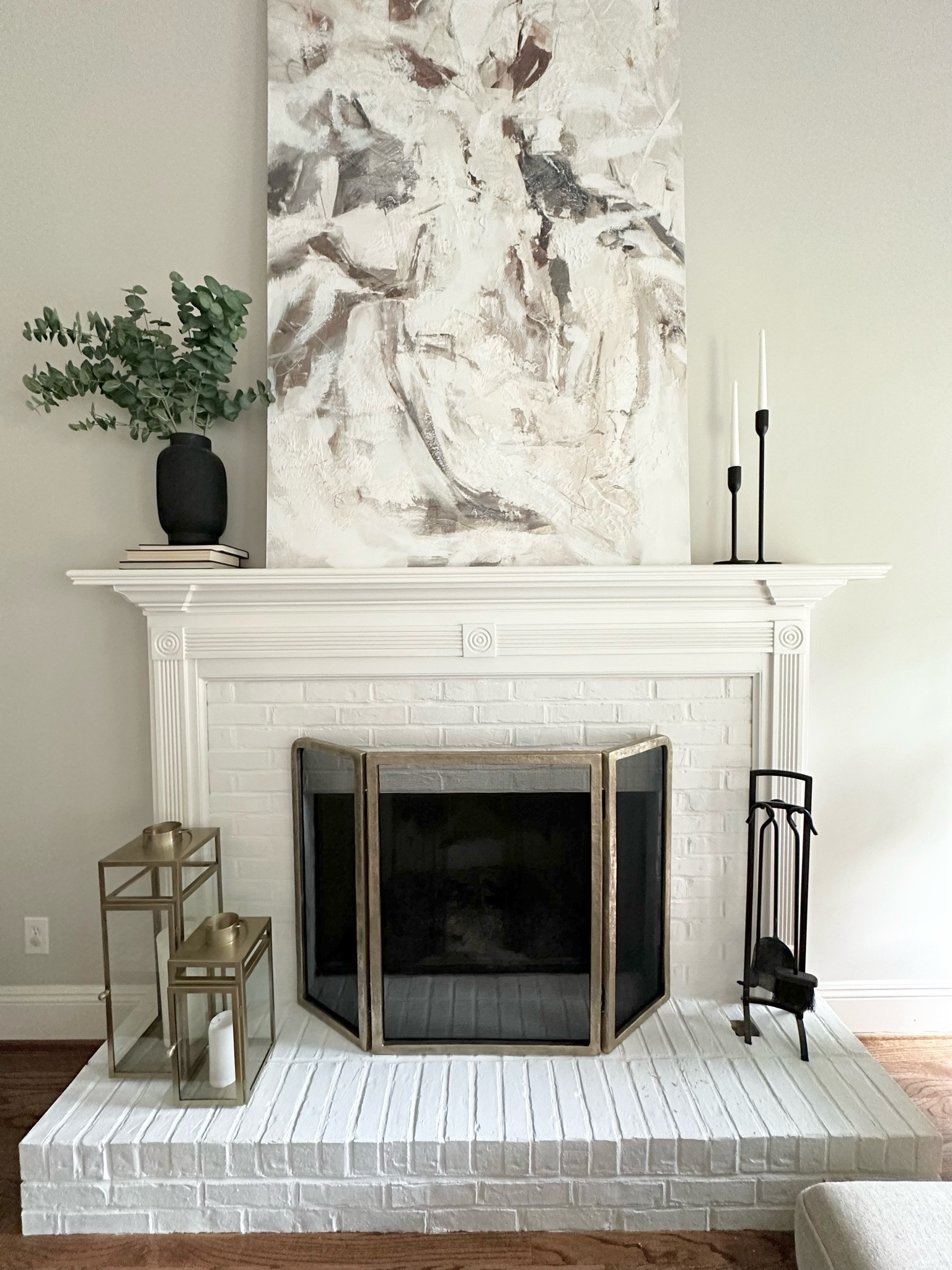 Fireplace, fireplace screen, gold and black accents, pottery barn, family room, neutral decor
