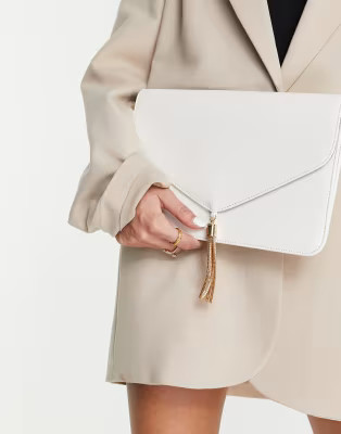 ASOS DESIGN tassel clutch bag in white | ASOS (Global)
