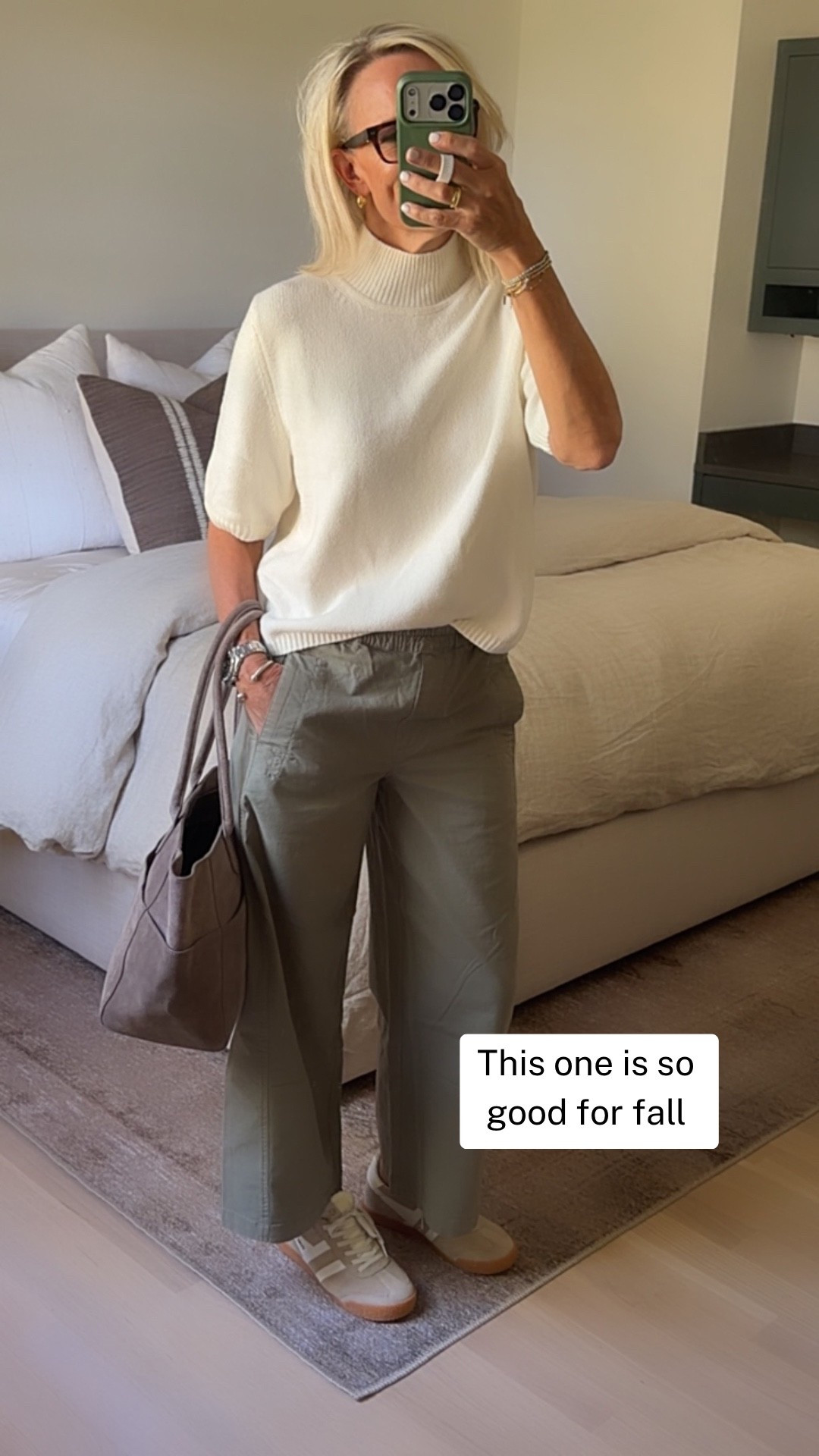 I’ve been looking for a short-sleeve mock-neck sweater like this for what feels like forever! The one I loved before sold out and never came back, so I was very happy to find this one. I sized up to a medium for a little more room and grabbed it in two colors because I knew I’d wear it often.

I love it with these wide-leg pants for an easy fall outfit, but it would also be so good with jeans, skirts, or layered under a jacket. Such a versatile piece for a fall wardrobe.

#LTKootd #LTKOver40 #LTKgrwm