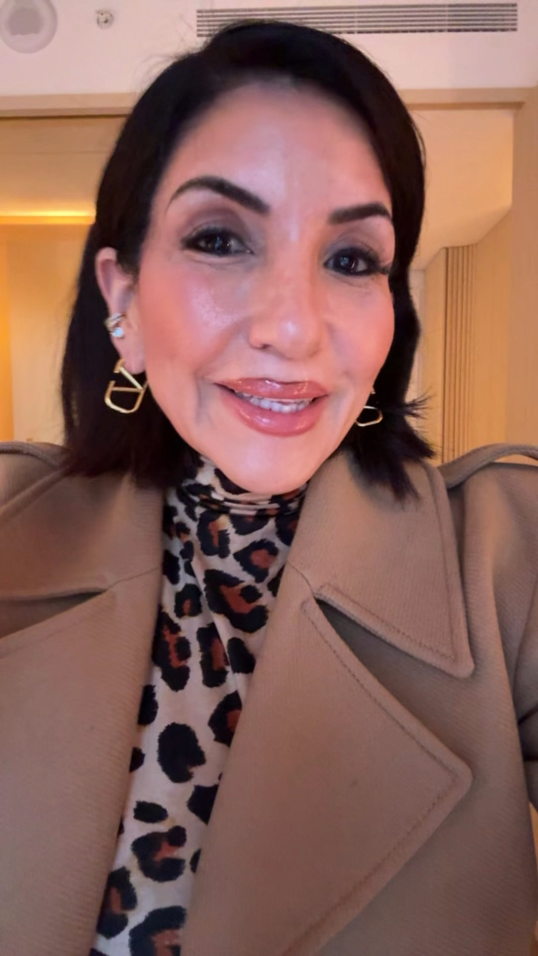 Camel Coat 
Leopard Turtle Neck
Petite Jeans 
Brown suede kitten heel boots 
Valentino Earrings 

#LTKSeasonal #LTKStyleTip #LTKOver40