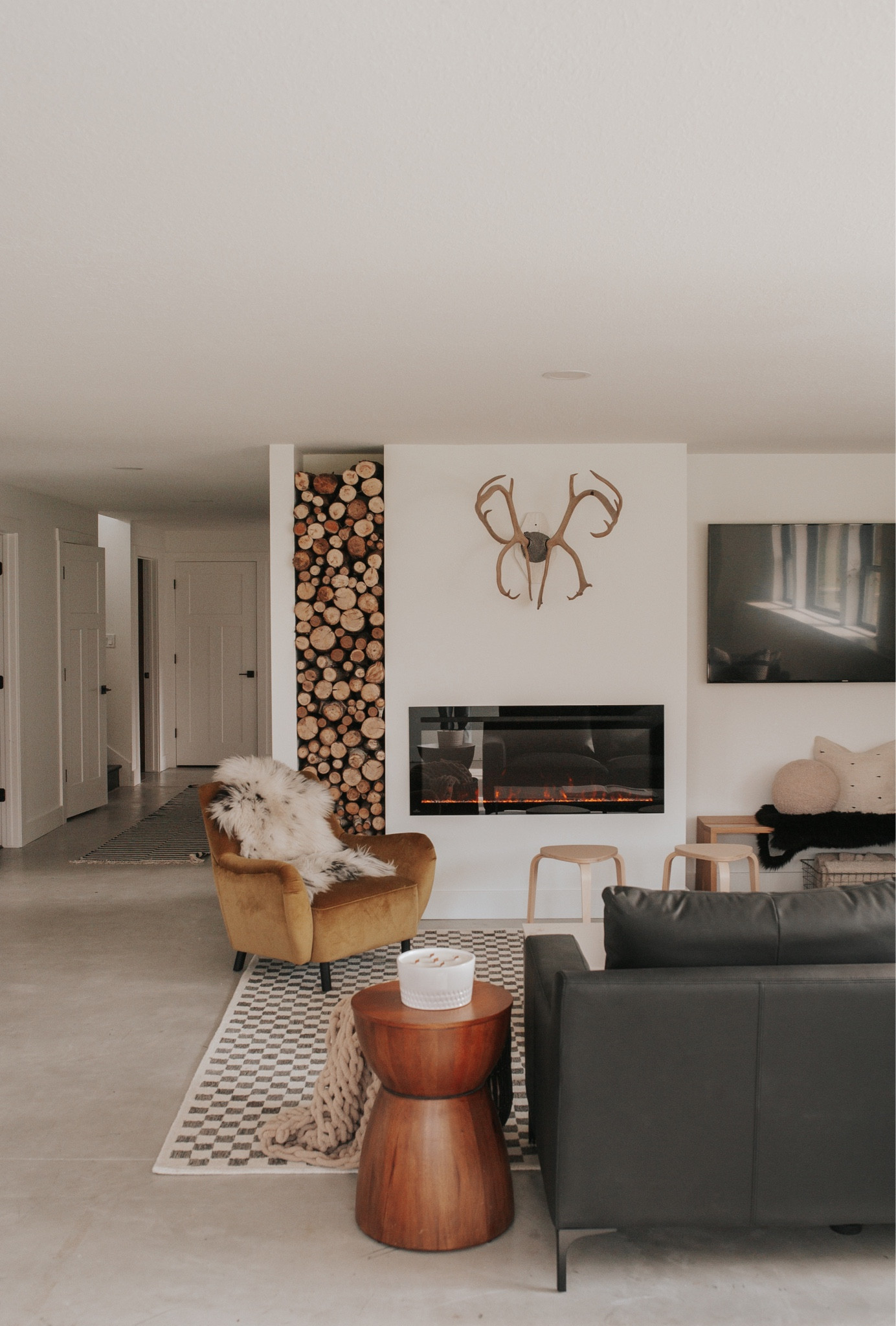 Lower level living room- industrial vibes, and making it fun! 

Minimal. Simple. Sofa chairs and rug linked. 🖤

#LTKhome