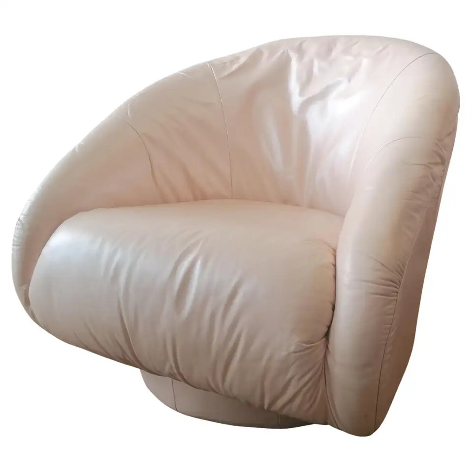 Pale blush pink pearlised leather swivel lounge chair by Natuzzi Italy 1980s | 1stDibs