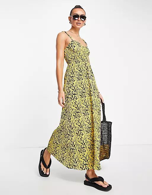 ASOS DESIGN plisse strappy maxi dress in yellow daisy print | ASOS (Global)