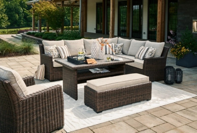 Brook Ranch Outdoor Sectional Set with Lounge Chair and Coffee Table | Ashley Homestore