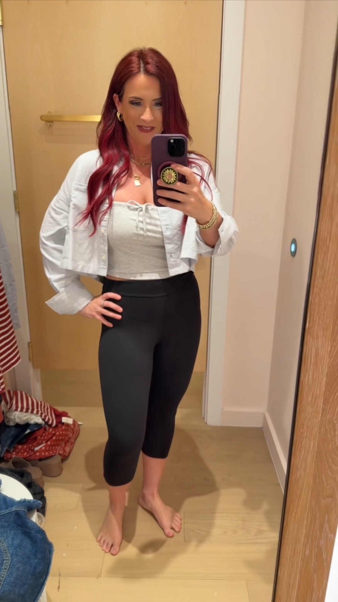 Aerie cropped button up shirt and a  gray tube top.  Black yoga pantss

#LTKSeasonal #LTKStyleTip